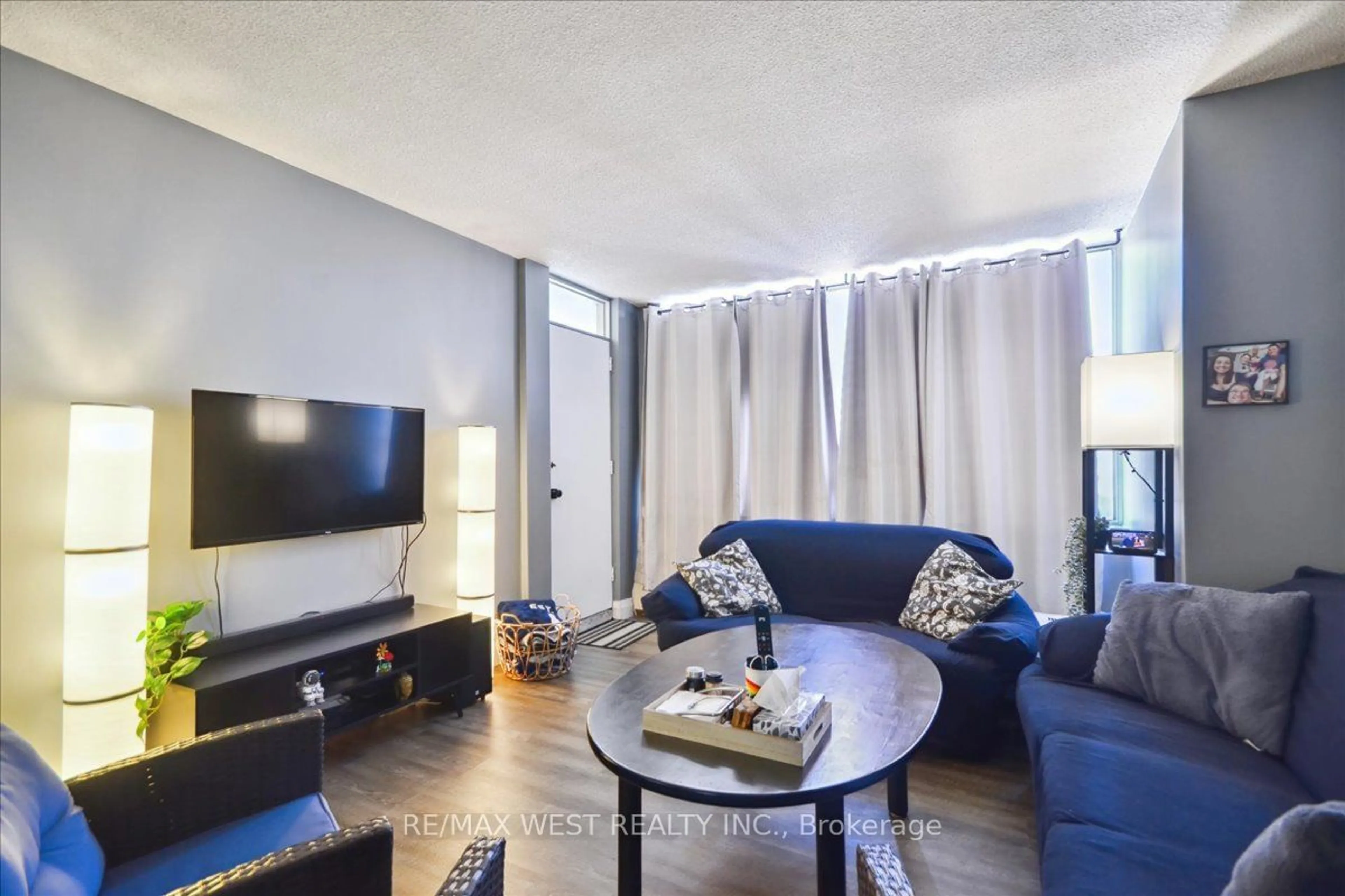 Living room with furniture, unknown for 340 Dixon Rd #1105, Toronto Ontario M9R 1T1