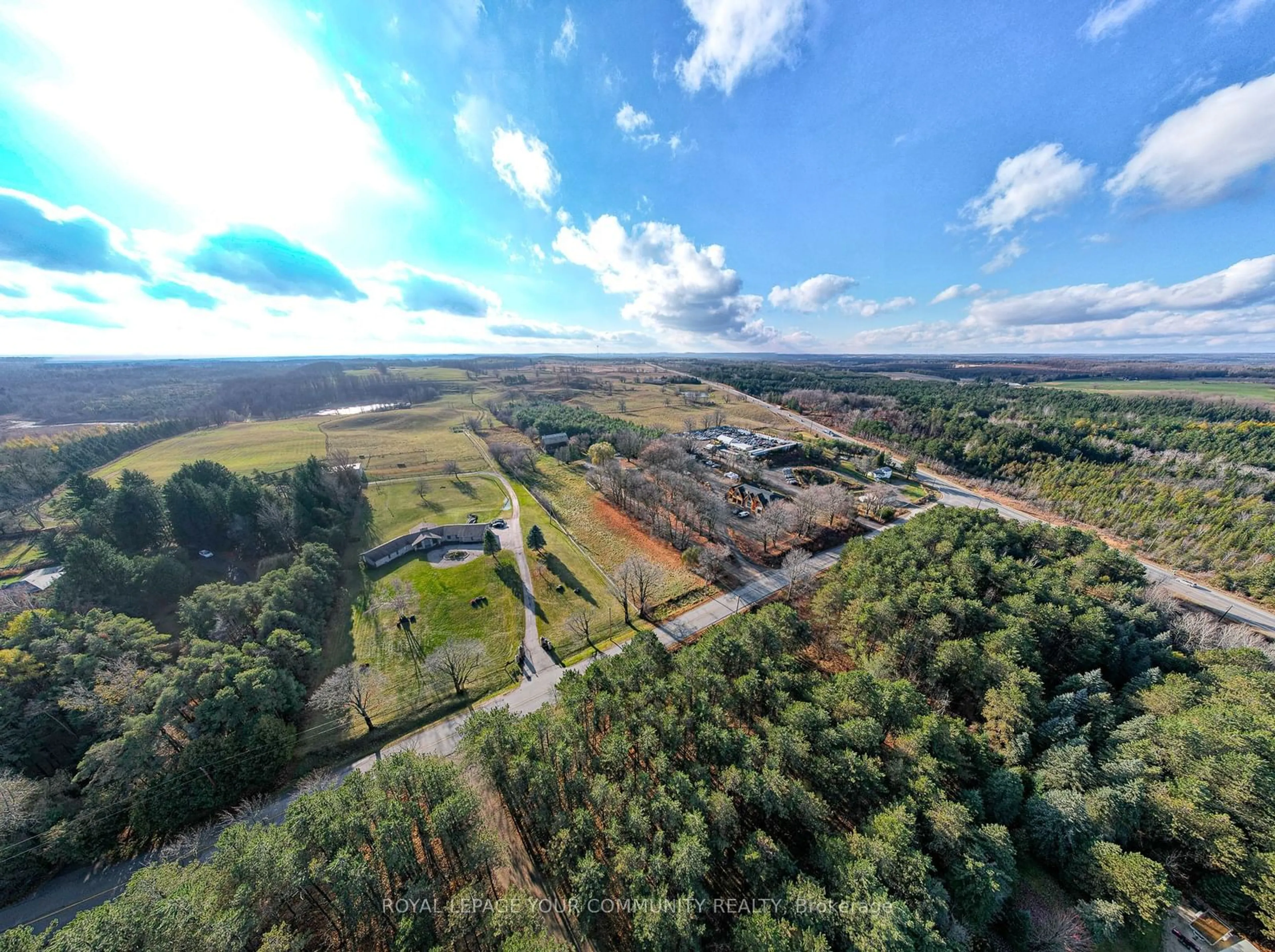 A pic from outside/outdoor area/front of a property/back of a property/a pic from drone, forest/trees view for 20364 St. Andrews Rd, Caledon Ontario L7K 2C9