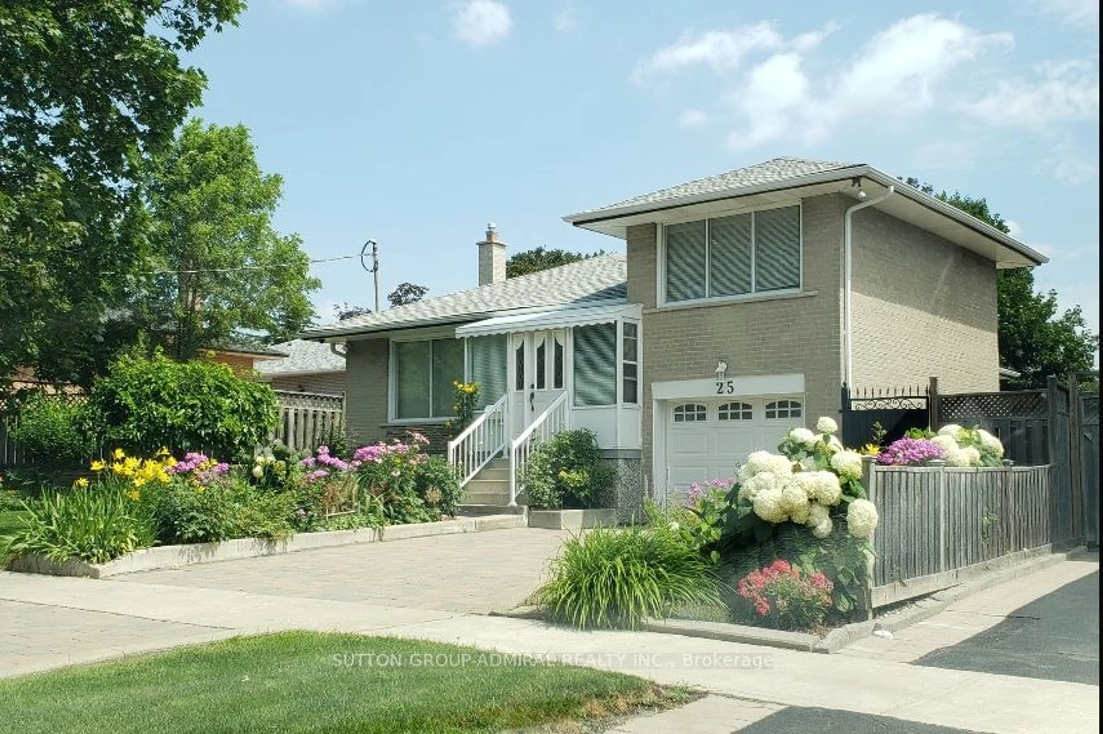 Home with vinyl exterior material, street for 25 Carsbrooke Rd, Toronto Ontario M9C 3C2