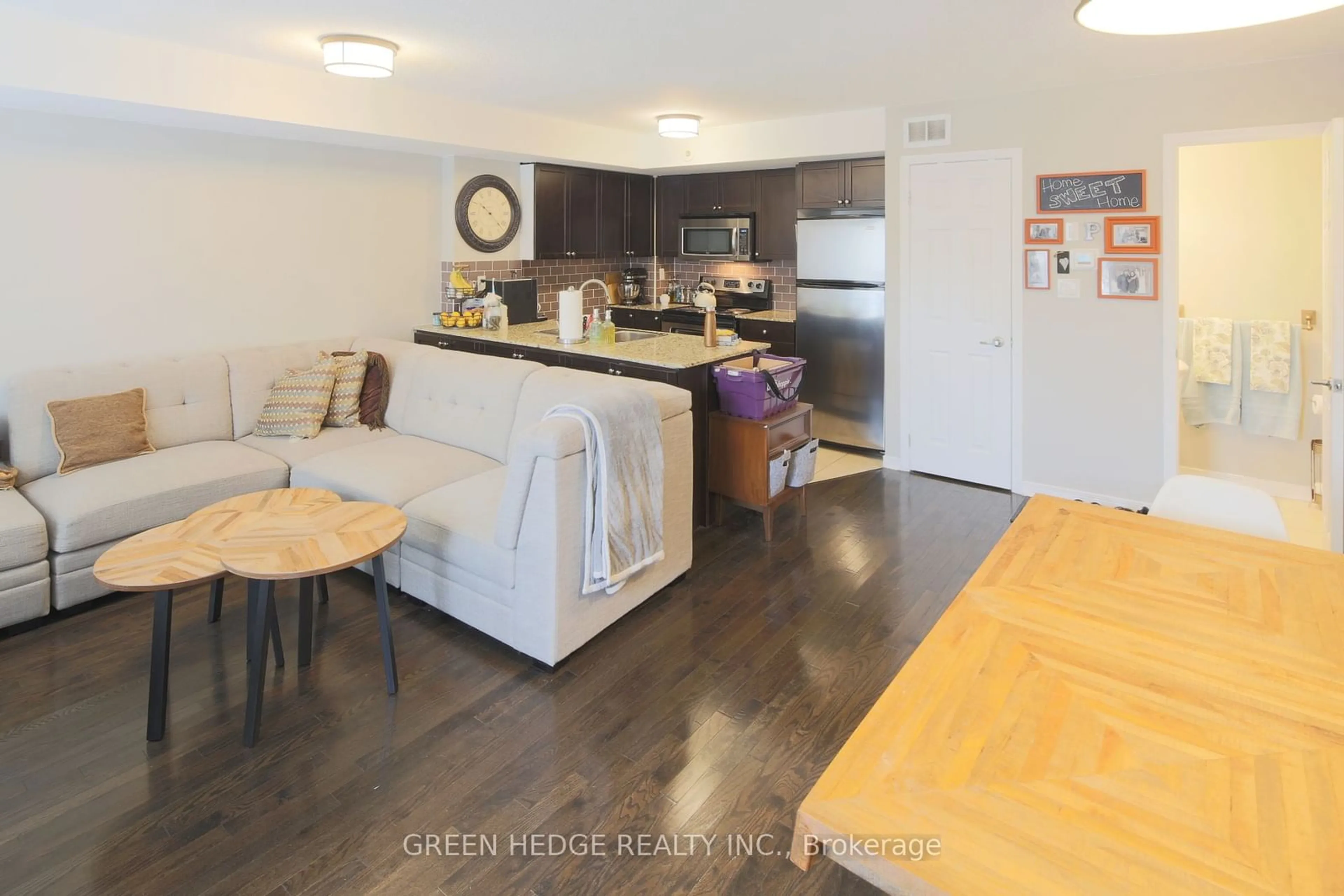 Open concept kitchen, wood/laminate floor for 20 Elsie Lane #218, Toronto Ontario M6P 3N9