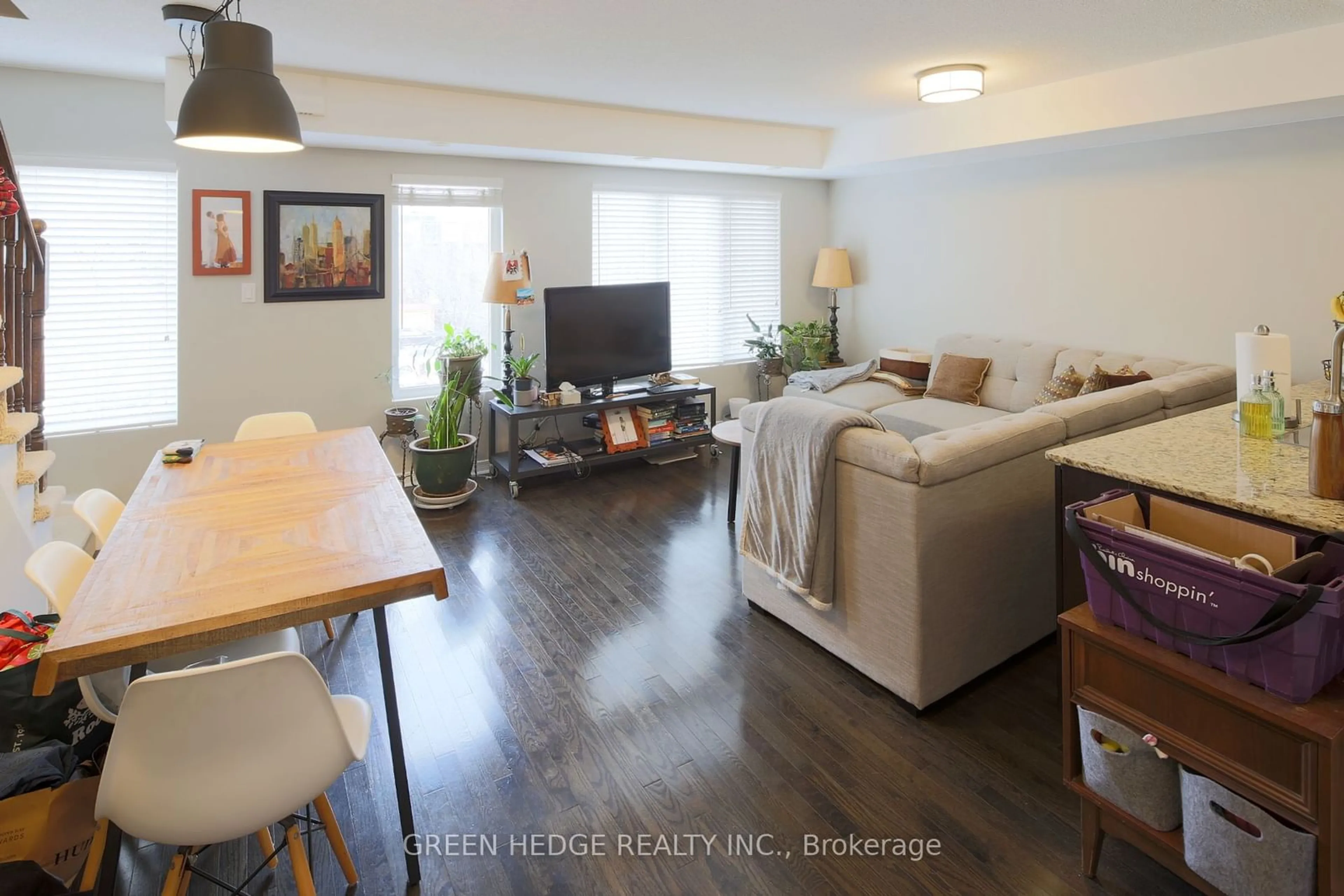 Living room with furniture, wood/laminate floor for 20 Elsie Lane #218, Toronto Ontario M6P 3N9