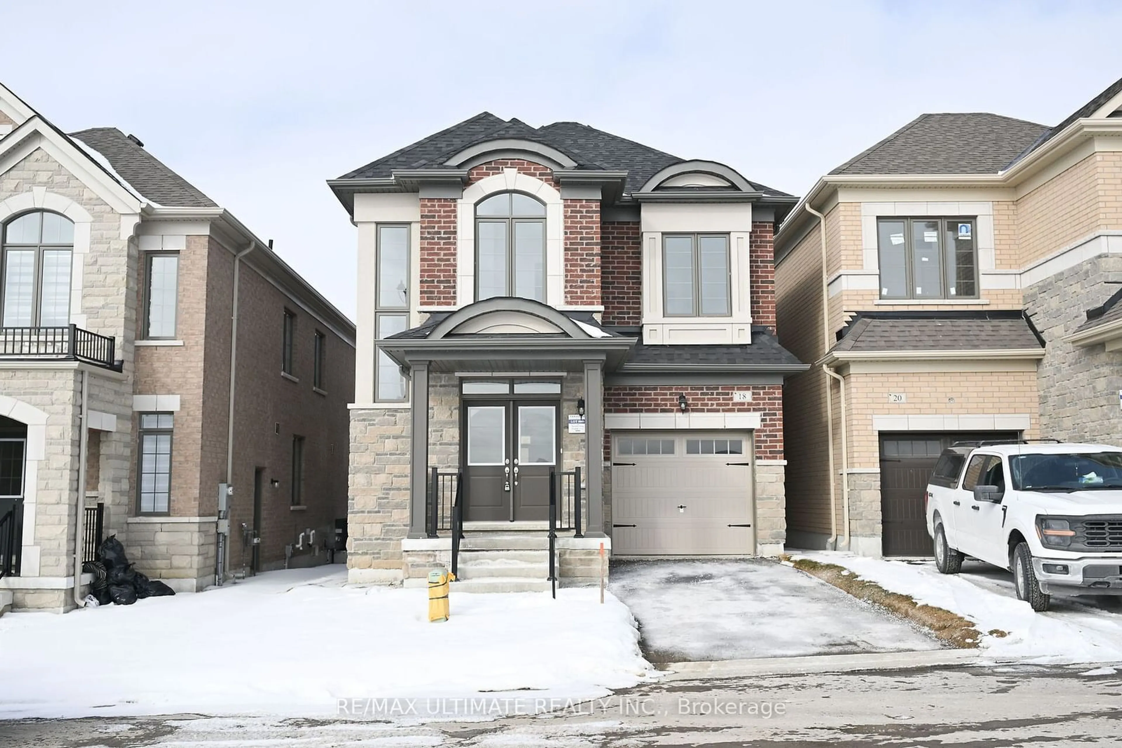 Home with brick exterior material, street for 18 Thresher St, Brampton Ontario L6Z 3N1