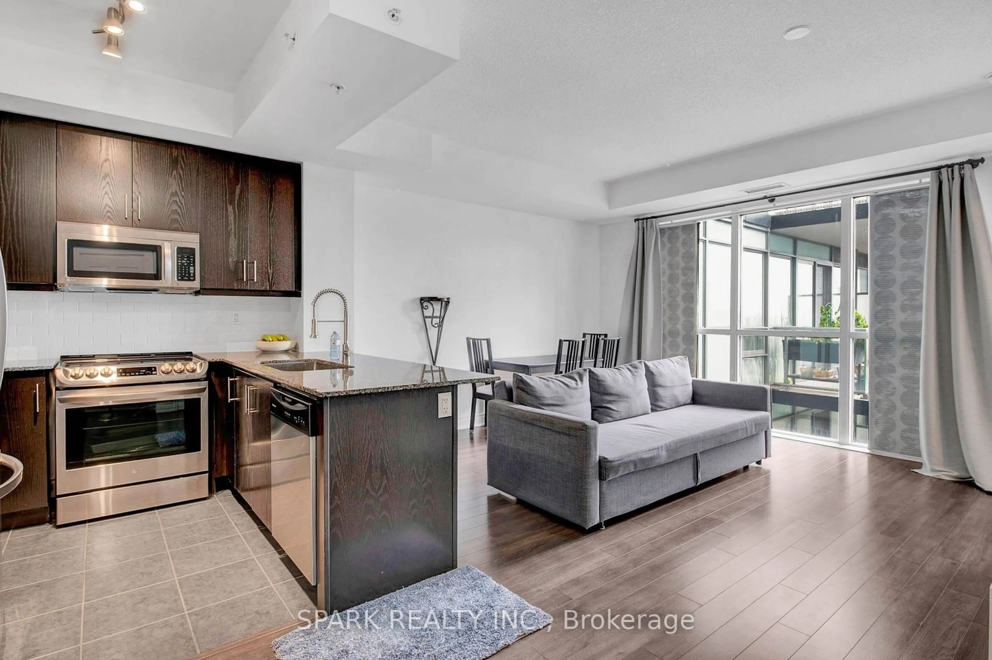 Open concept kitchen, unknown for 15 James Finlay Way #1018, Toronto Ontario M3M 0B3