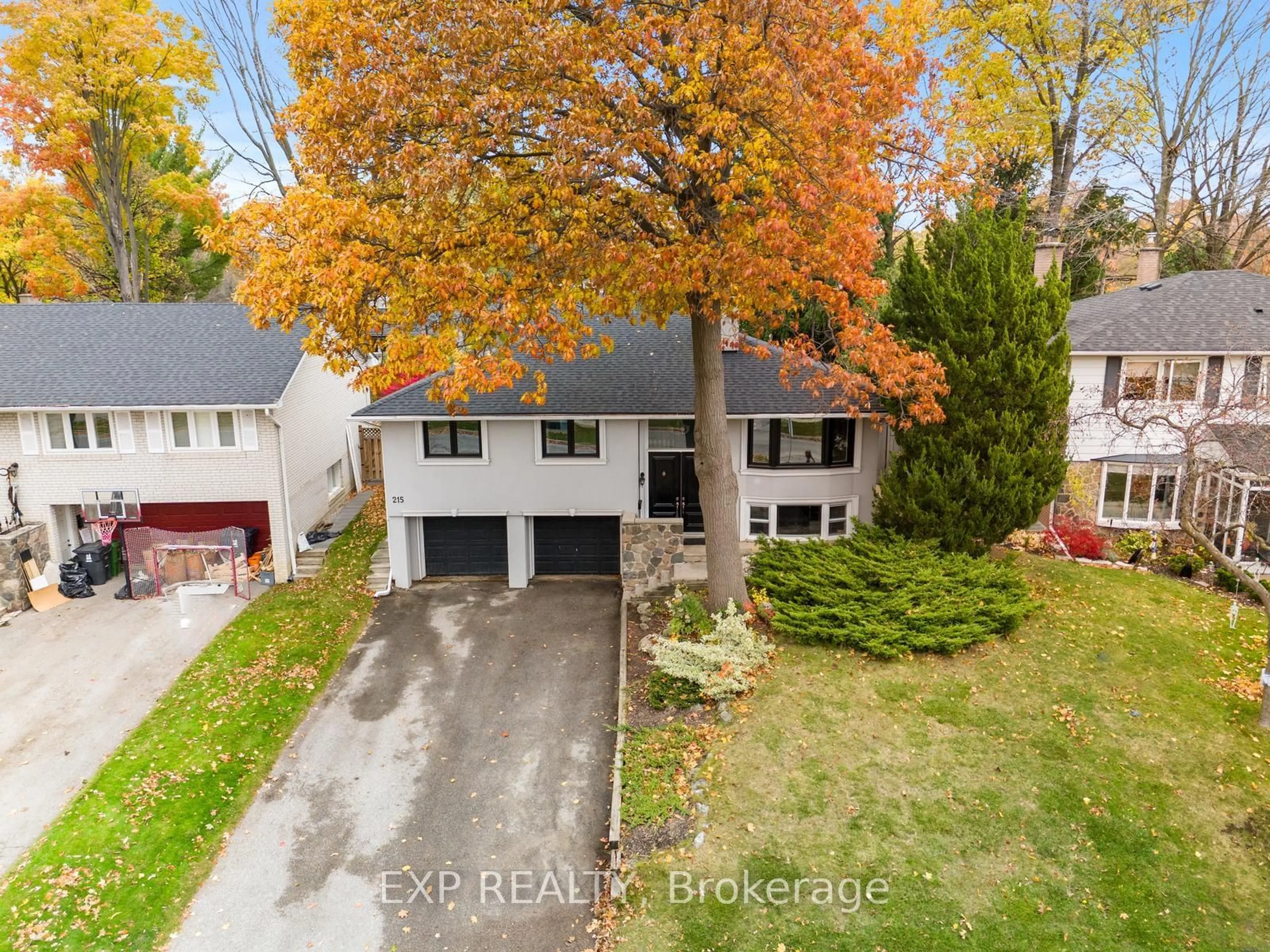 A pic from outside/outdoor area/front of a property/back of a property/a pic from drone, street for 215 Mill Rd, Toronto Ontario M9C 1Y1