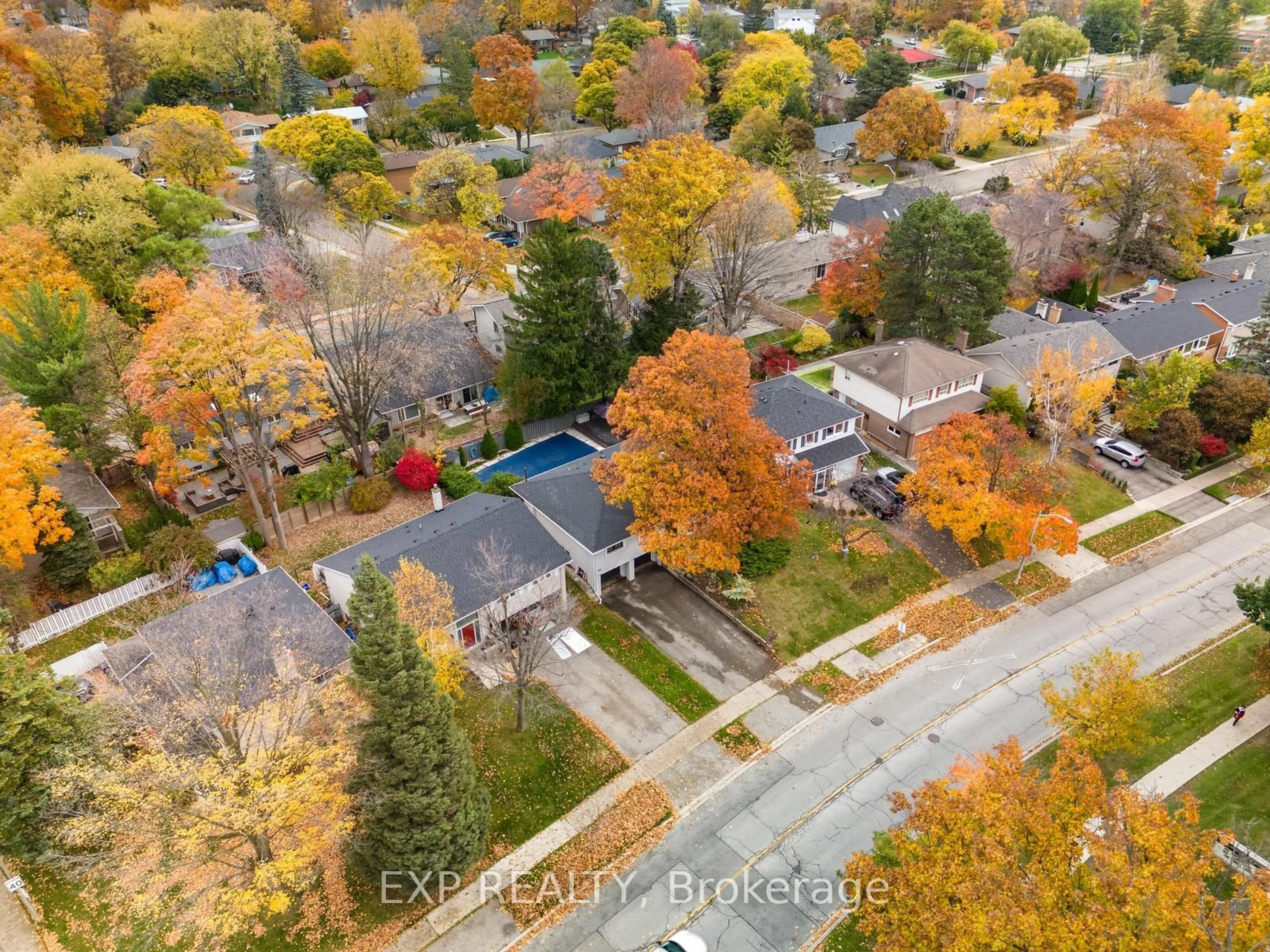 A pic from outside/outdoor area/front of a property/back of a property/a pic from drone, street for 215 Mill Rd, Toronto Ontario M9C 1Y1