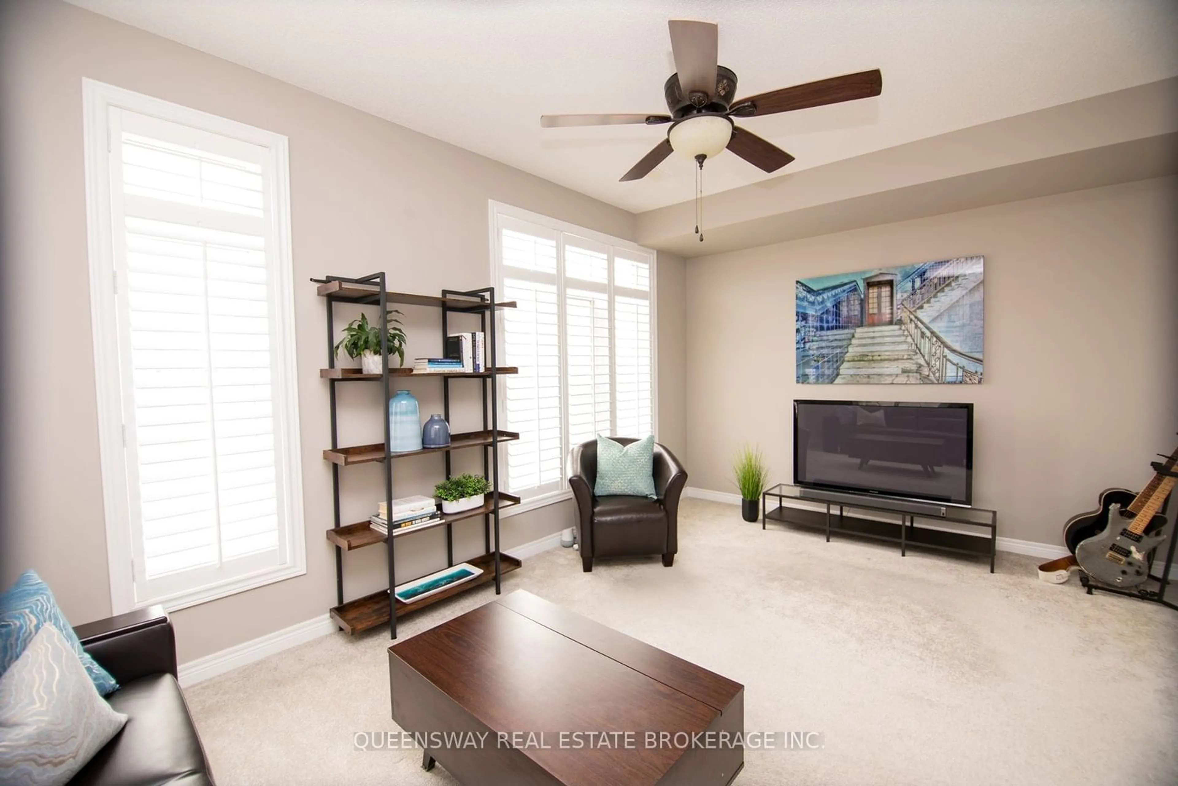 Living room with furniture, ceramic/tile floor for 4139 Palermo Common, Burlington Ontario L7L 0G7