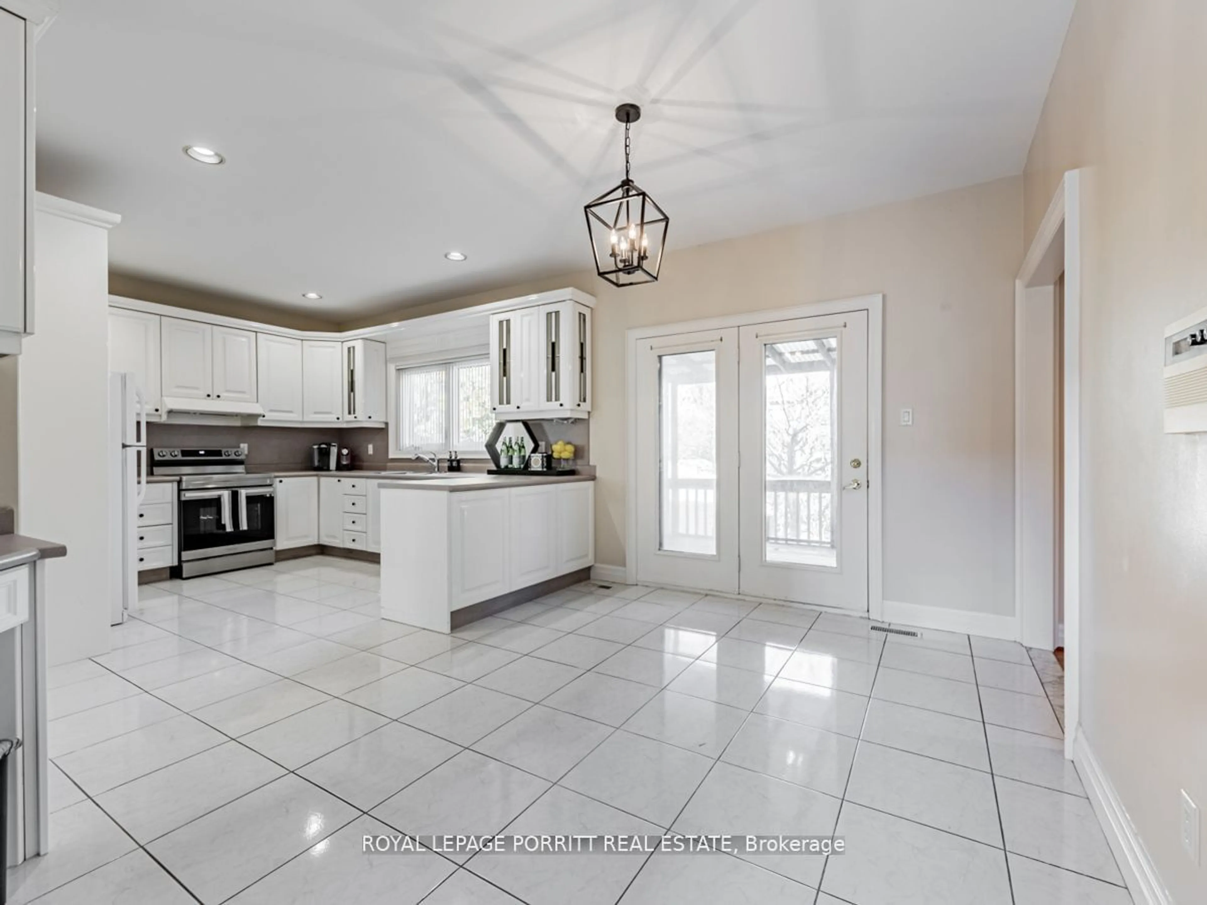 Open concept kitchen, ceramic/tile floor for 8 Lovilla Blvd, Toronto Ontario M9M 1C3