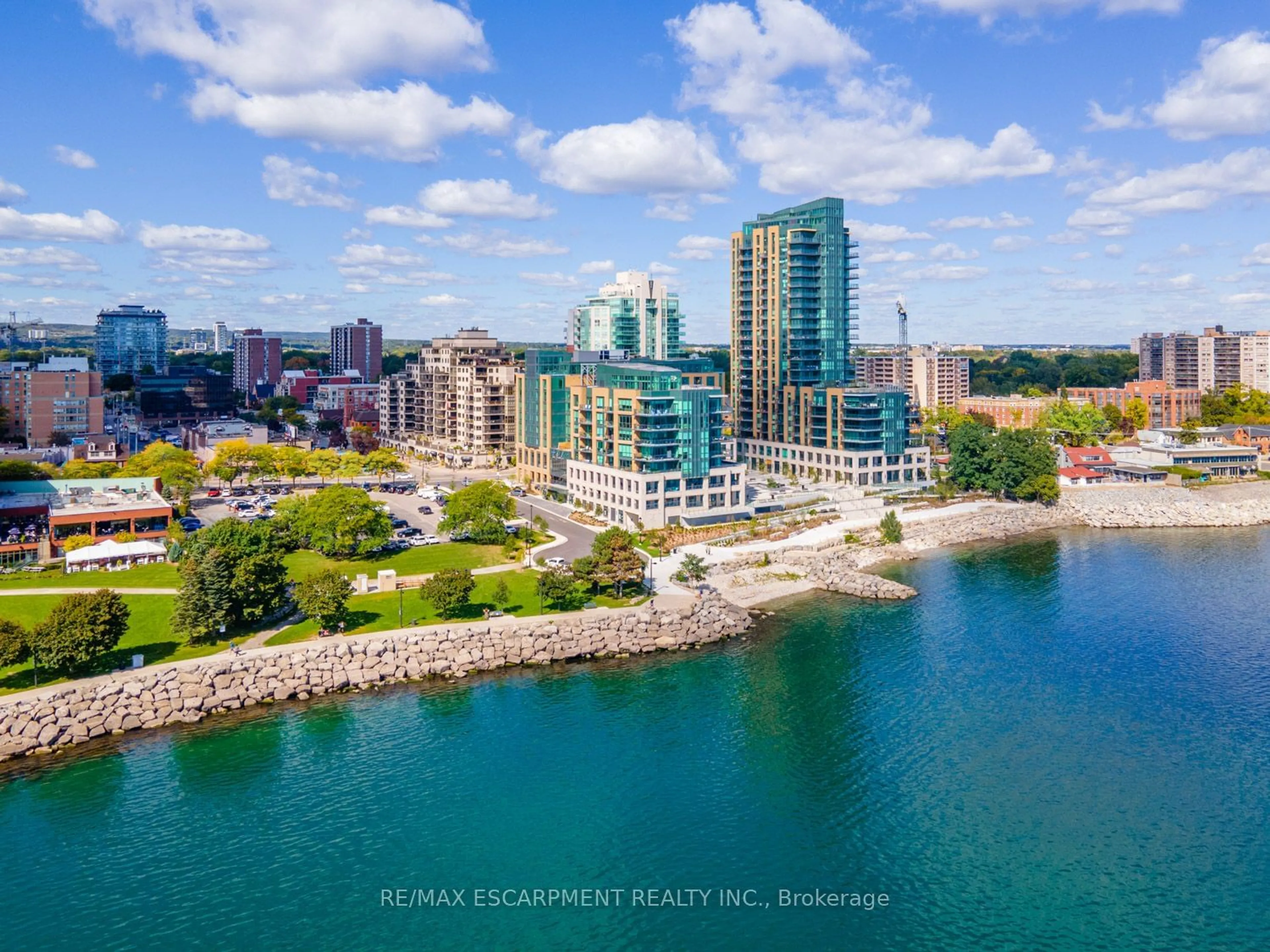 A pic from outside/outdoor area/front of a property/back of a property/a pic from drone, water/lake/river/ocean view for 2060 Lakeshore Rd #1401, Burlington Ontario L7R 0G2