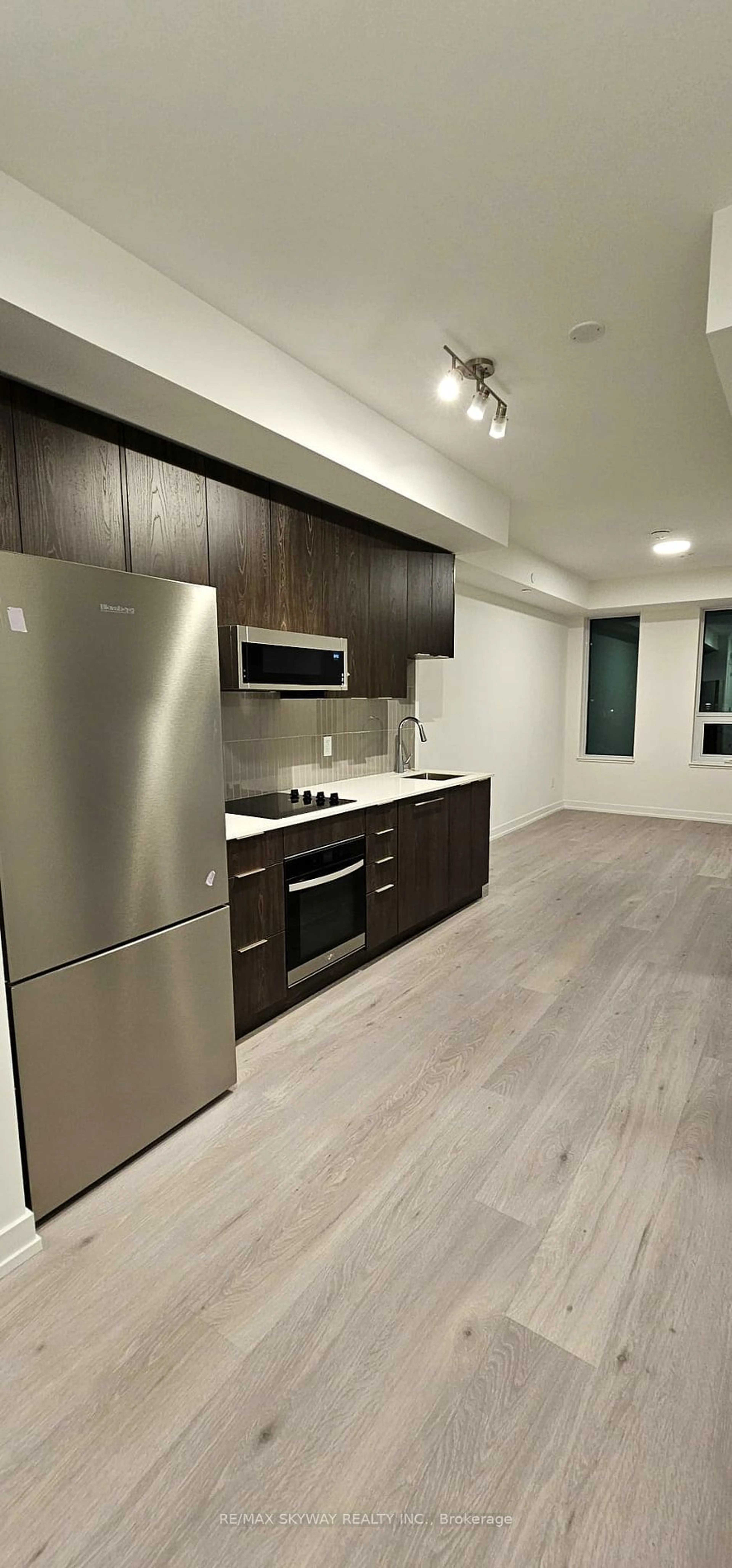 Standard kitchen, wood/laminate floor for 2501 Saw Whet Blvd #214, Oakville Ontario L6M 5N2