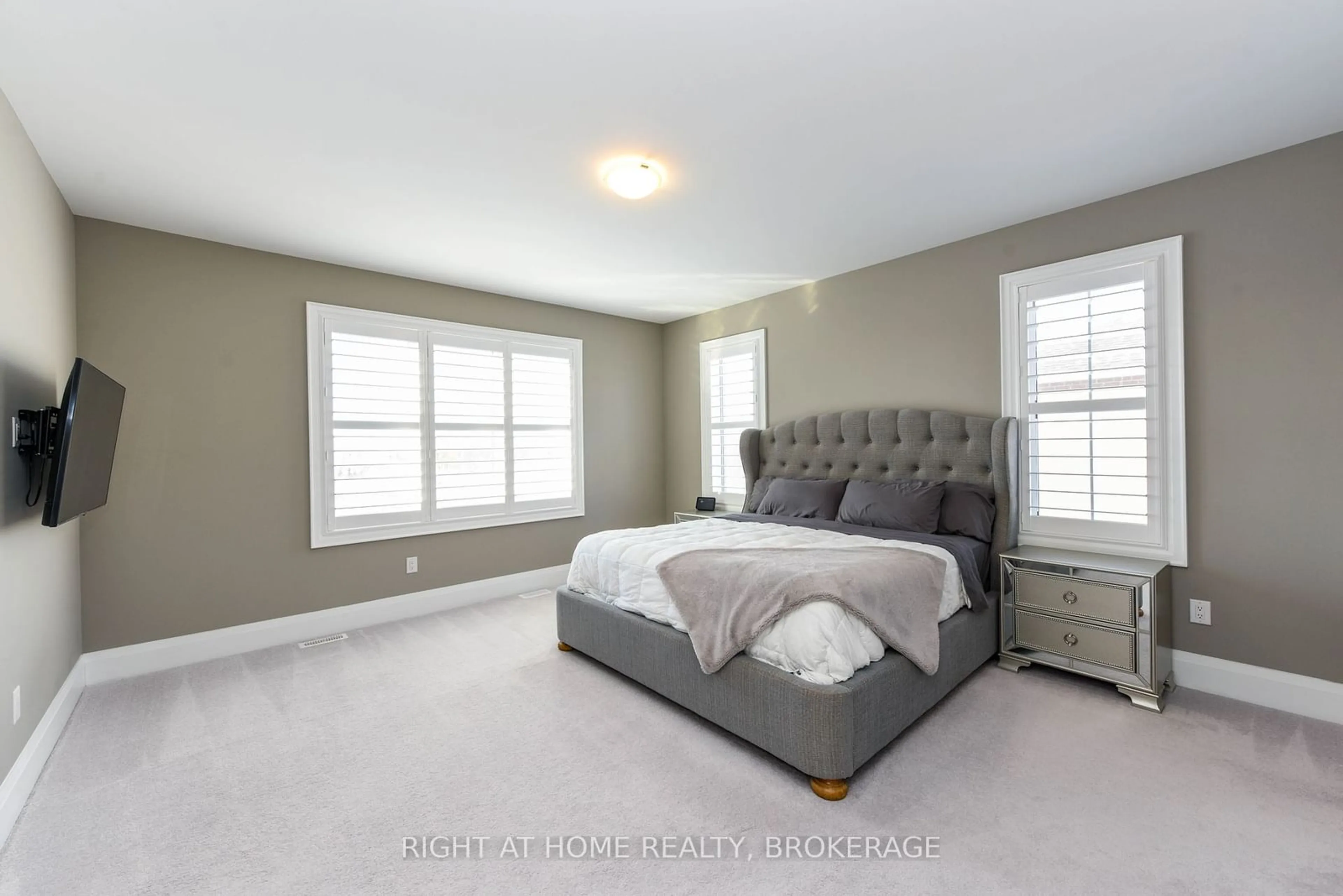 Bedroom with bed, carpet floor for 107 Yates Dr, Milton Ontario L9E 1S5