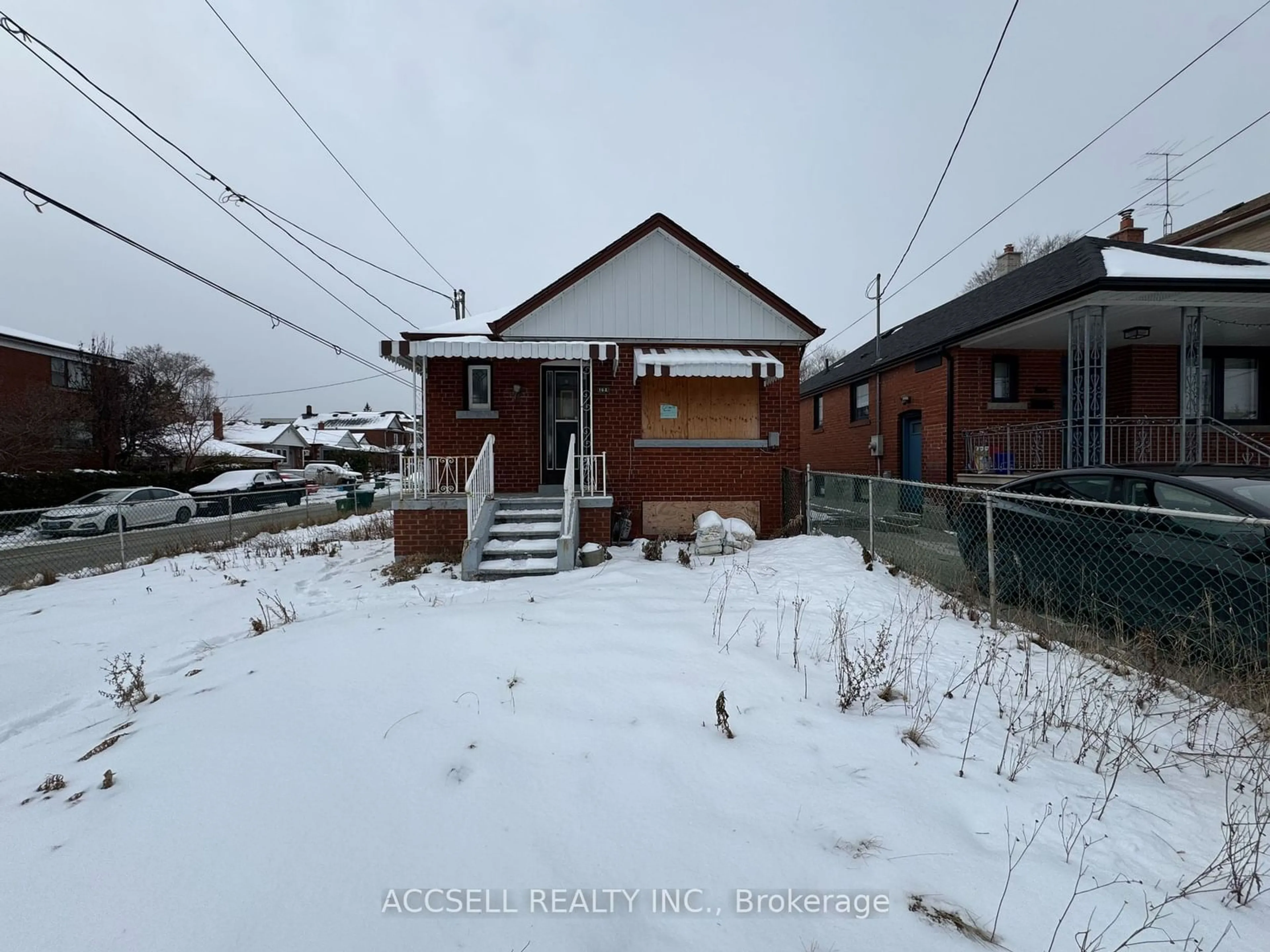 A pic from outside/outdoor area/front of a property/back of a property/a pic from drone, street for 162 Times Rd, Toronto Ontario M6B 3M6