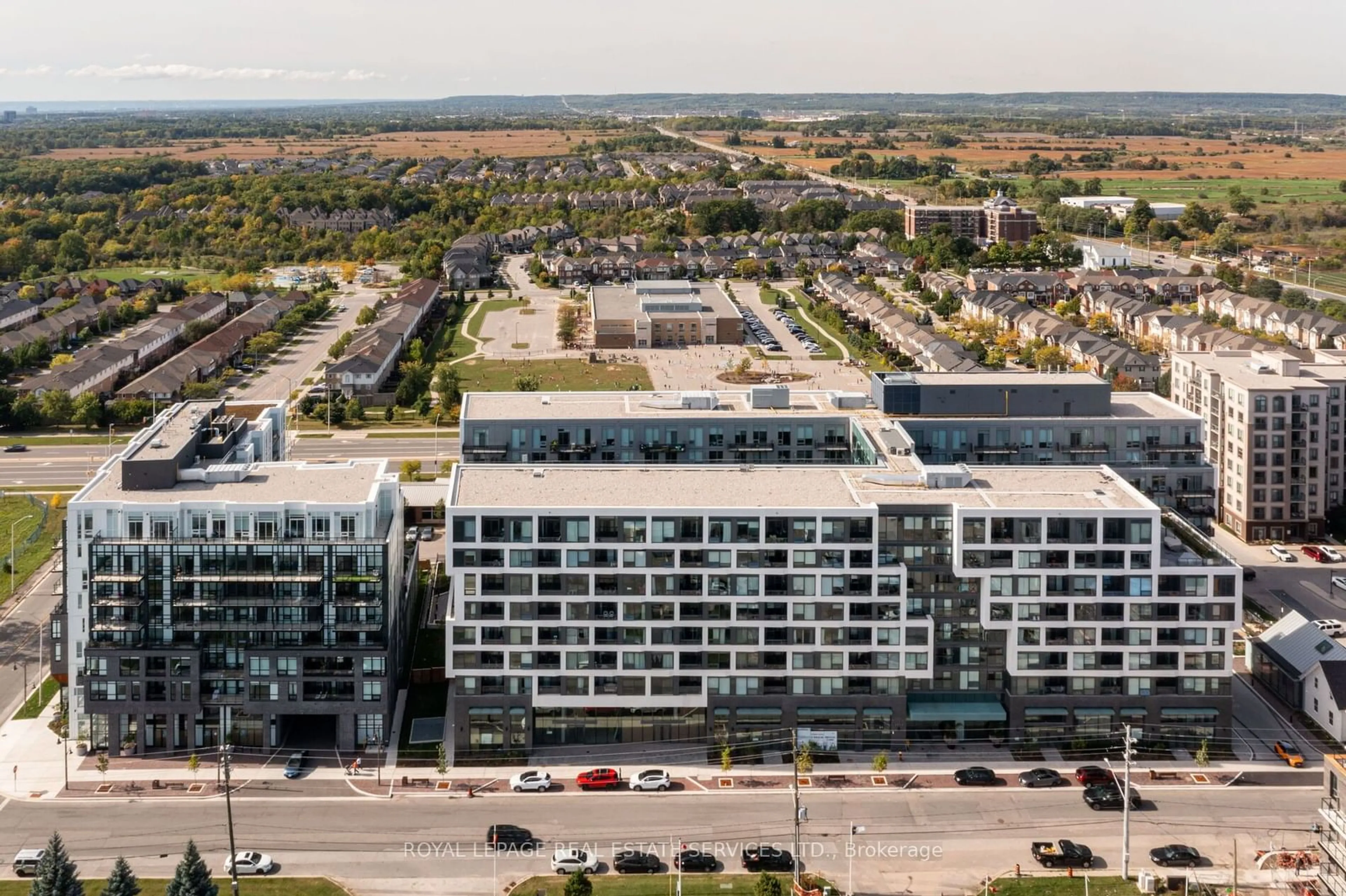 A pic from outside/outdoor area/front of a property/back of a property/a pic from drone, city buildings view from balcony for 2450 Old Bronte Rd #720, Oakville Ontario L6M 5P6