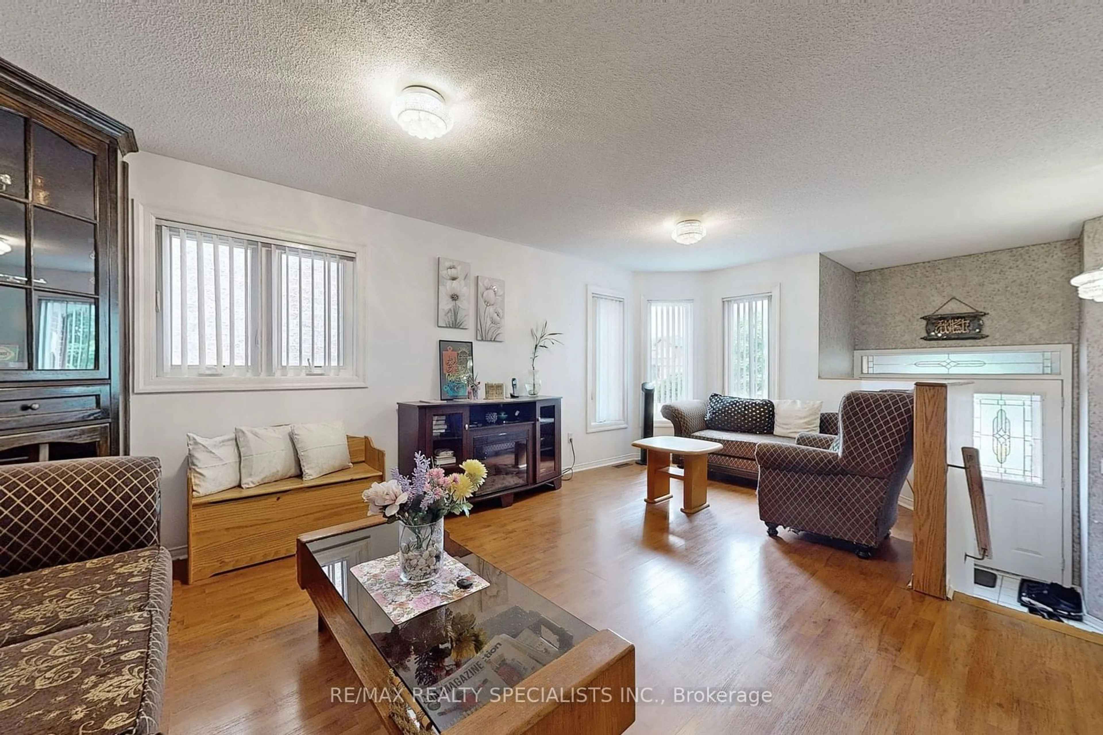 Living room with furniture, unknown for 69 Red Maple Dr, Brampton Ontario L6X 4M1