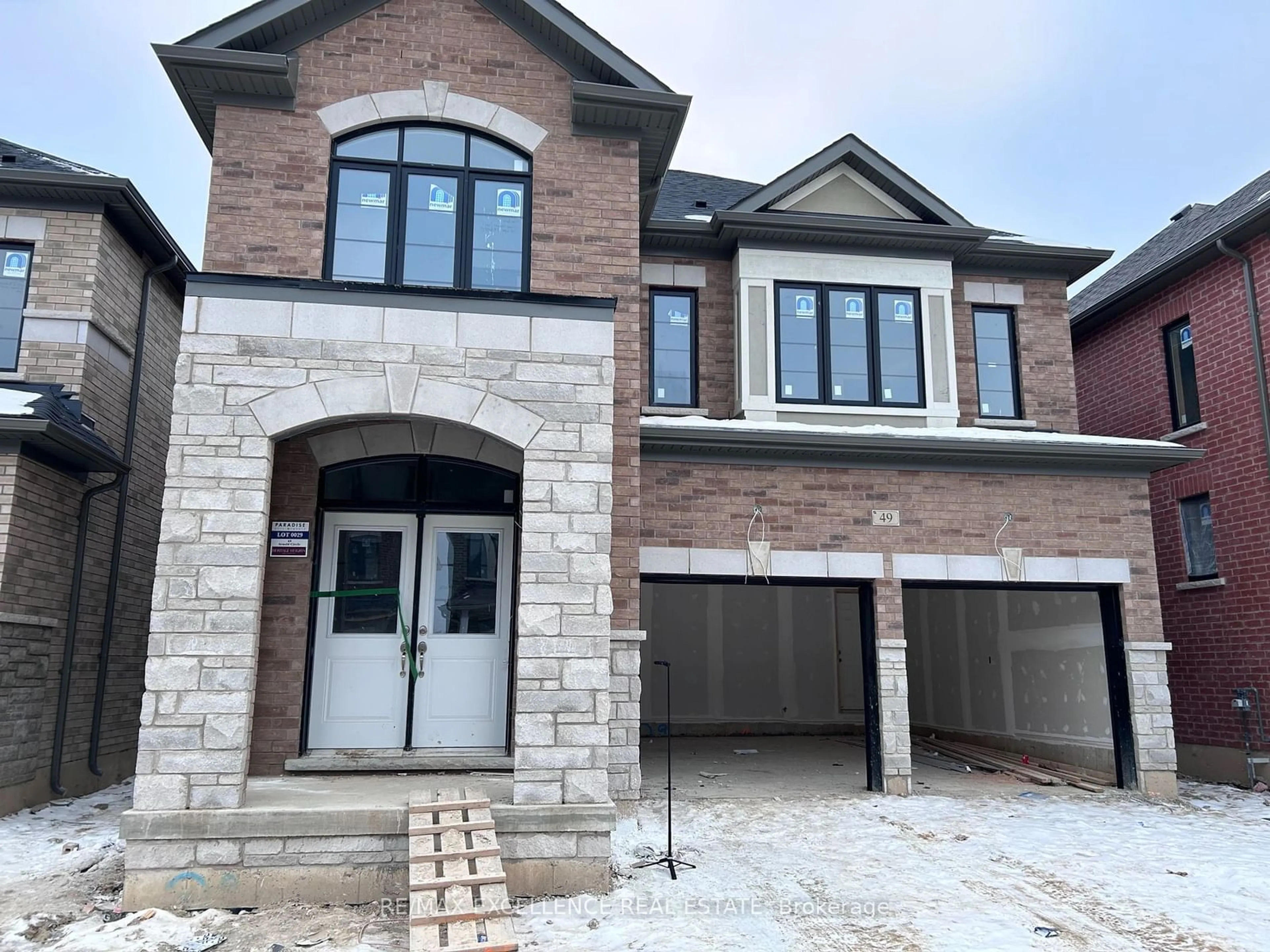 Home with brick exterior material, street for 49 Arnold Circ, Brampton Ontario L7A 0B8