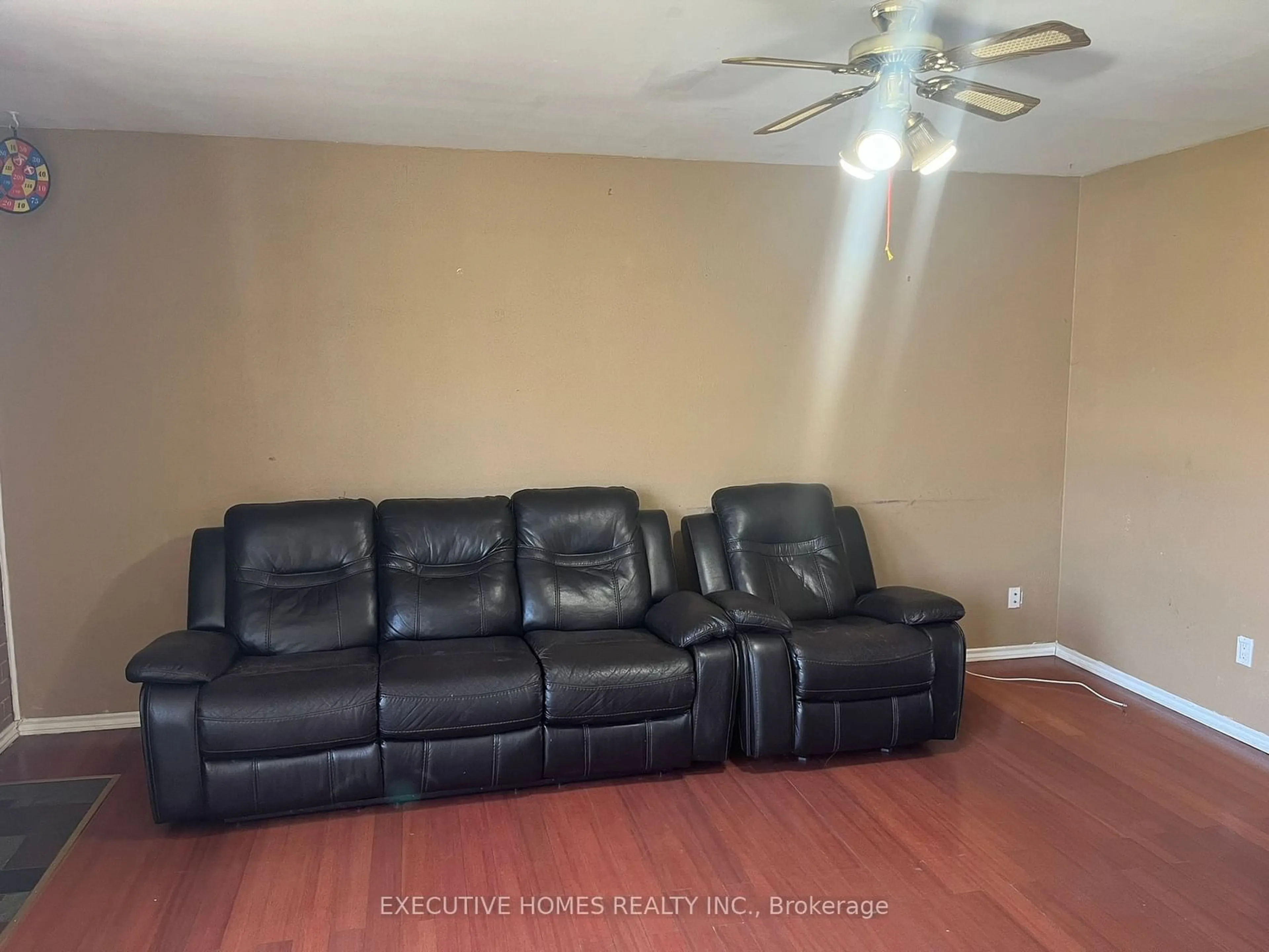 Living room with furniture, unknown for 19 Langwith Crt, Brampton Ontario L6Y 1Z9