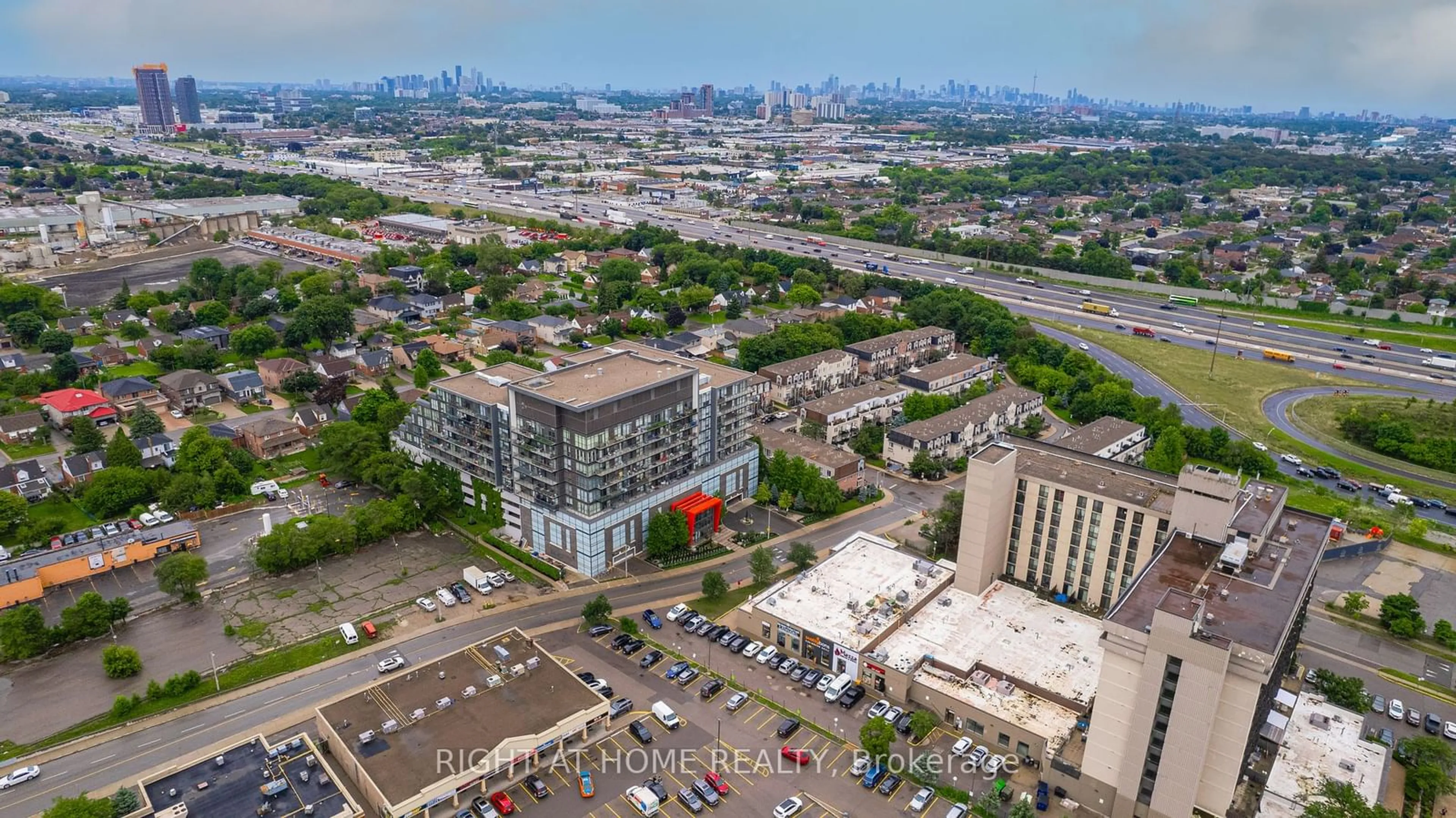 A pic from outside/outdoor area/front of a property/back of a property/a pic from drone, city buildings view from balcony for 15 James Finlay Way #917, Toronto Ontario M3M 0B3