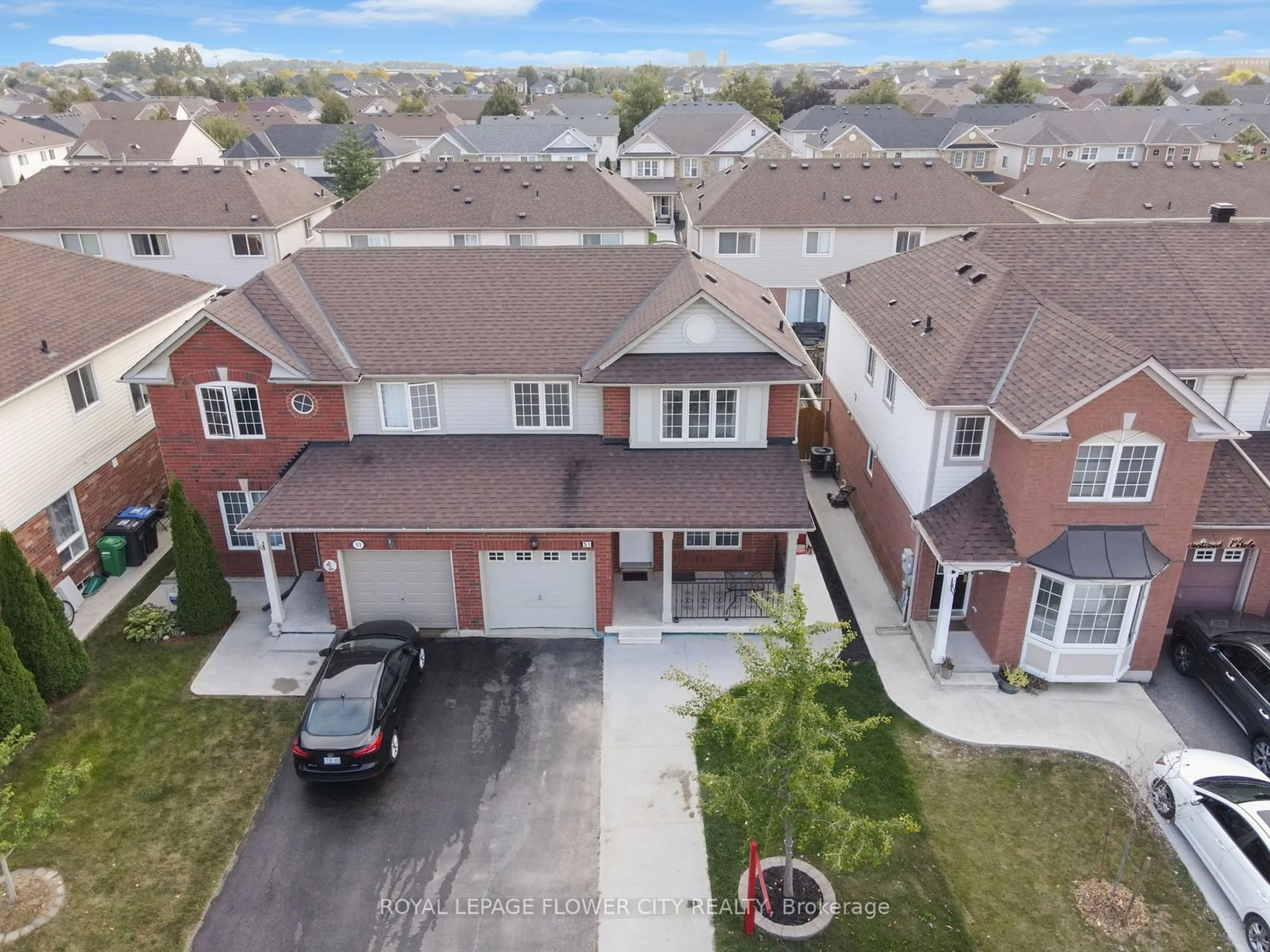 A pic from outside/outdoor area/front of a property/back of a property/a pic from drone, street for 51 Sweetwood Circ, Brampton Ontario L7A 2X7