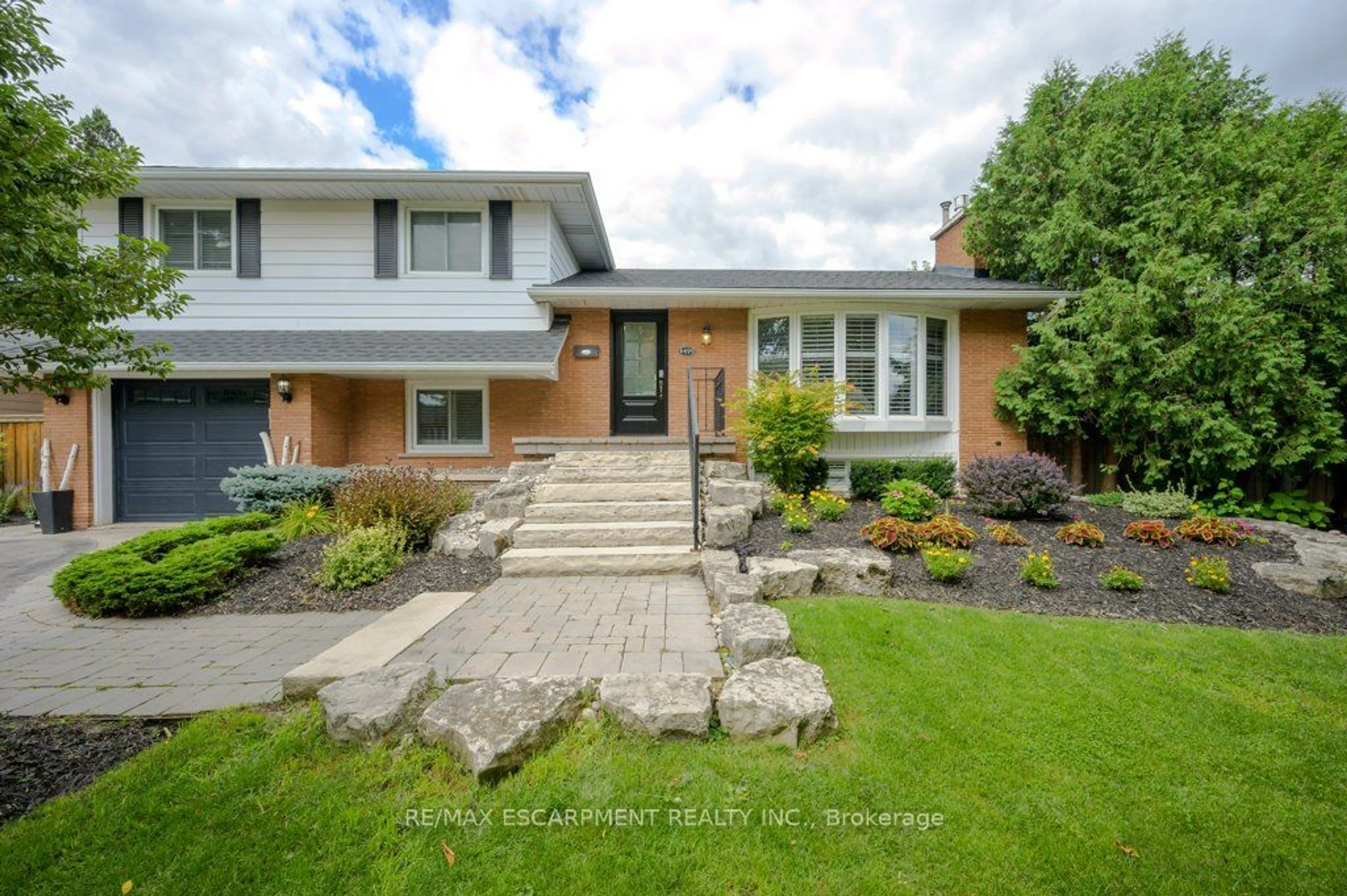 Home with brick exterior material, street for 4499 Rogers Rd, Burlington Ontario L7L 1S2