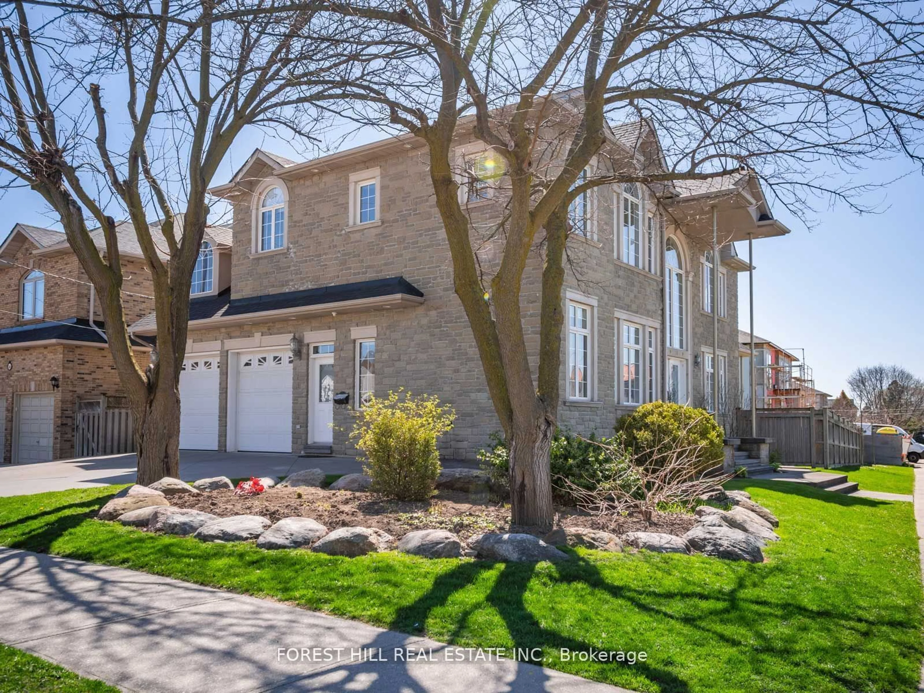 Home with brick exterior material, street for 18 Highland Hill, Toronto Ontario M6A 2P8