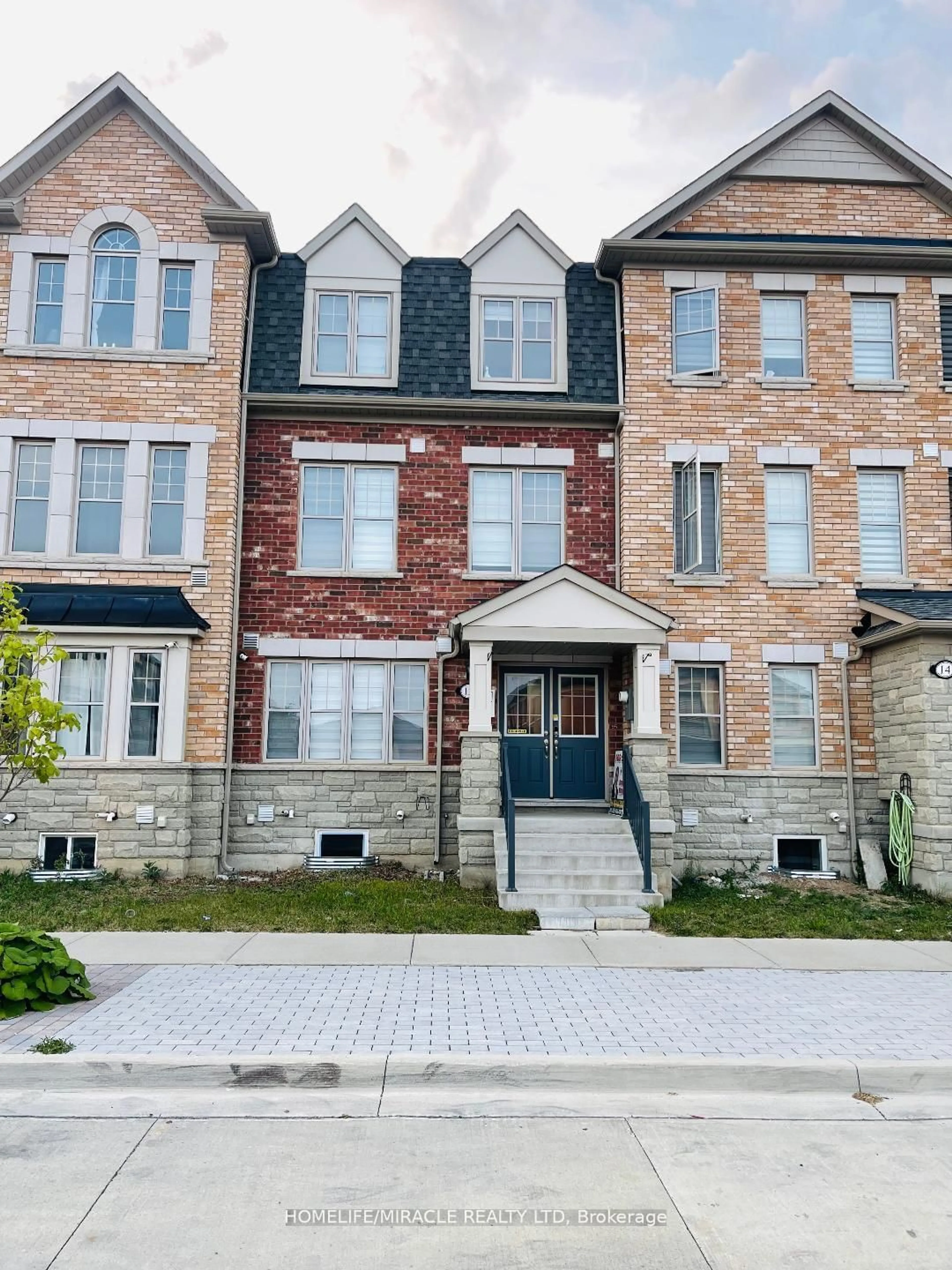 Home with brick exterior material, street for 12 Remembrance Rd, Brampton Ontario L7A 4Z1