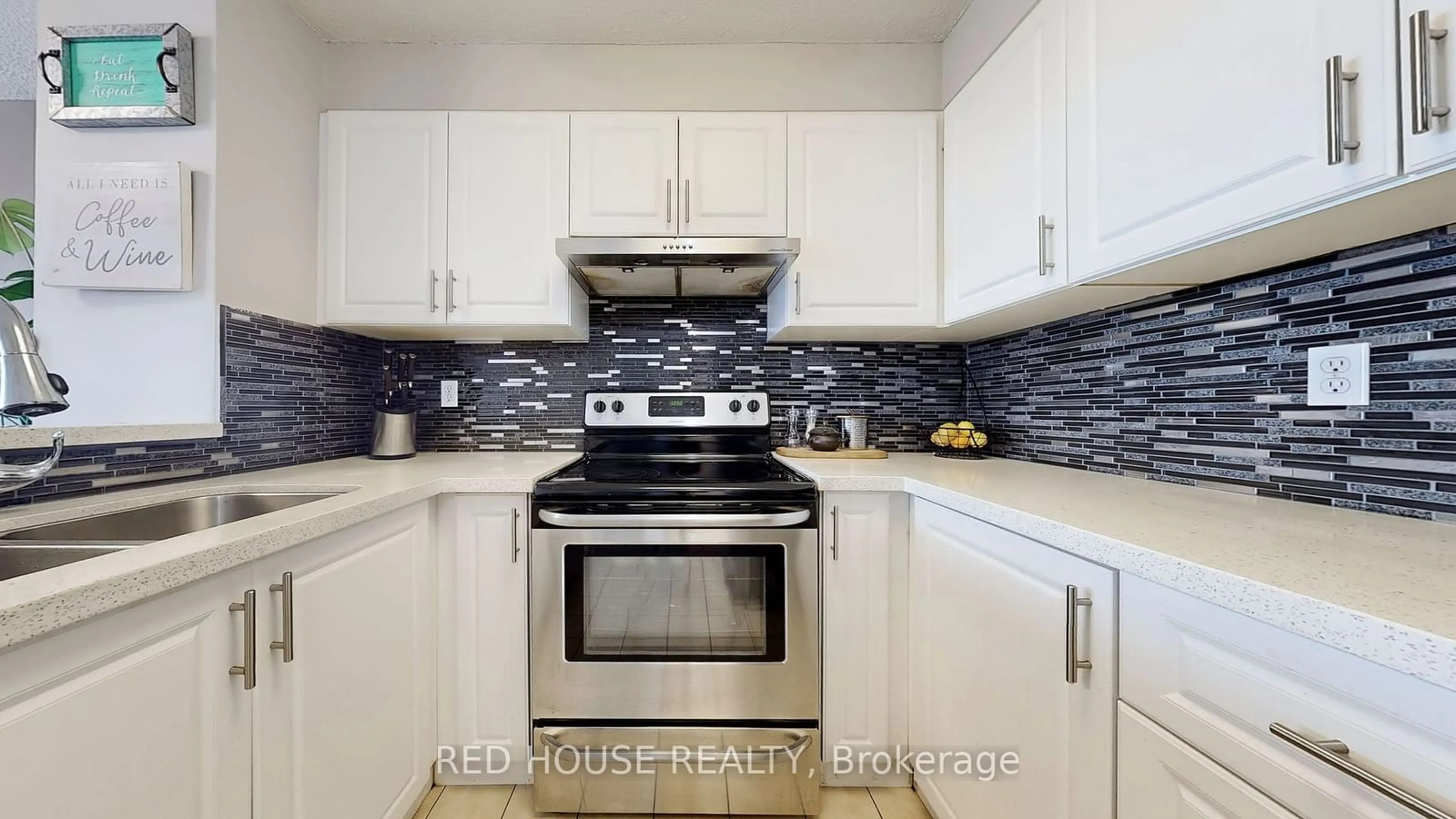 Standard kitchen, ceramic/tile floor for 2155 Burnhamthorpe Rd #1408, Mississauga Ontario L5L 5P9