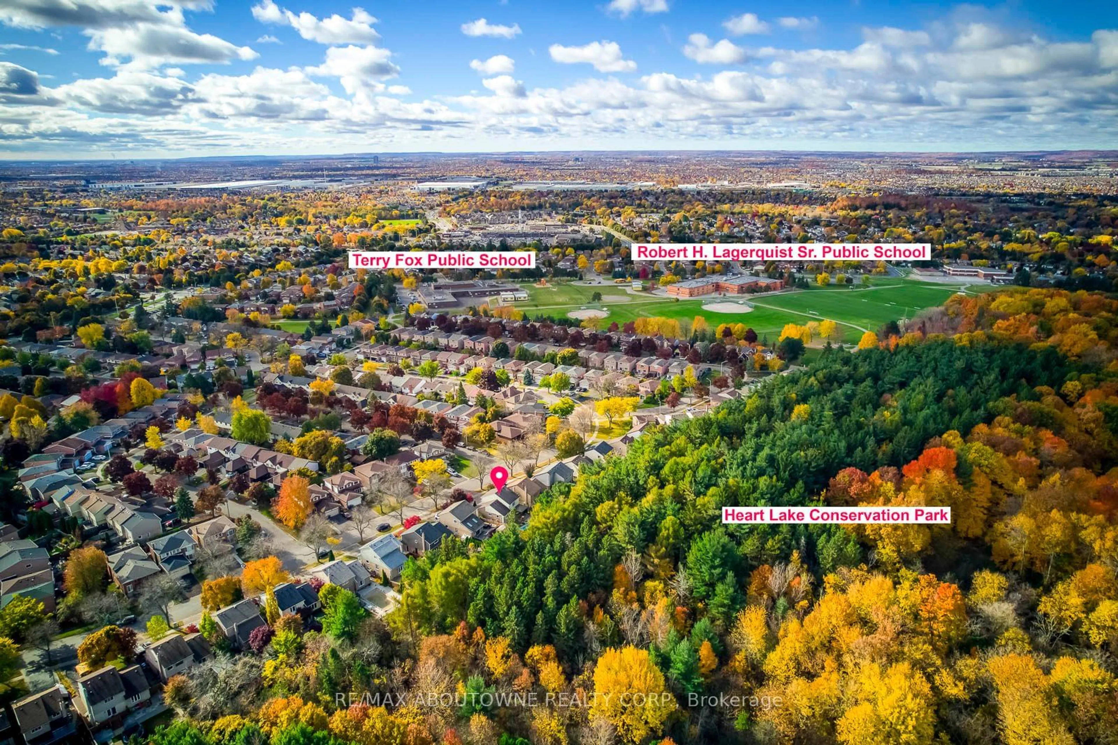 A pic from outside/outdoor area/front of a property/back of a property/a pic from drone, forest/trees view for 96 royal palm Dr, Brampton Ontario L6Z 1P7