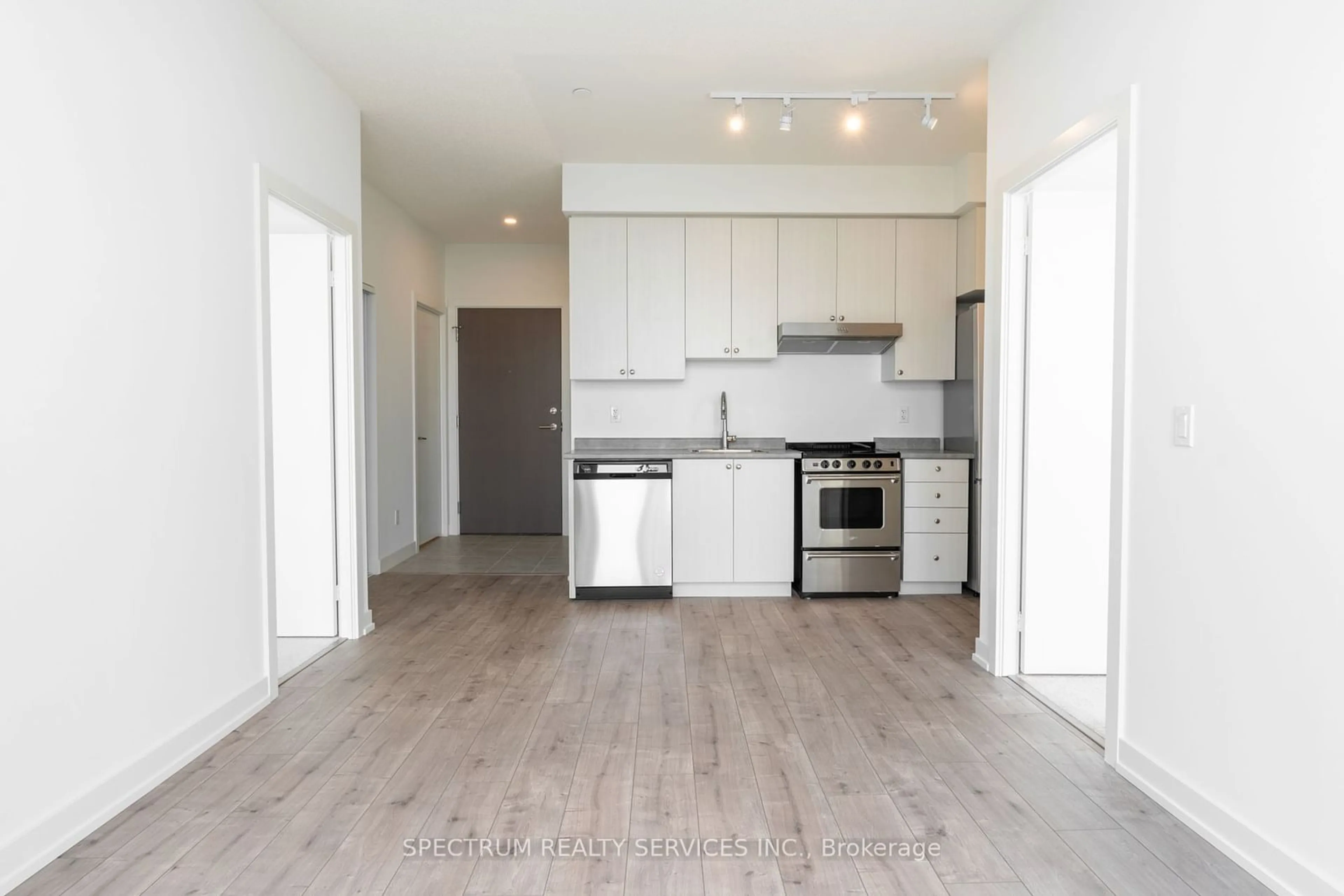 Open concept kitchen, wood/laminate floor for 10 Wilby Cres #2202, Toronto Ontario M9N 0B6