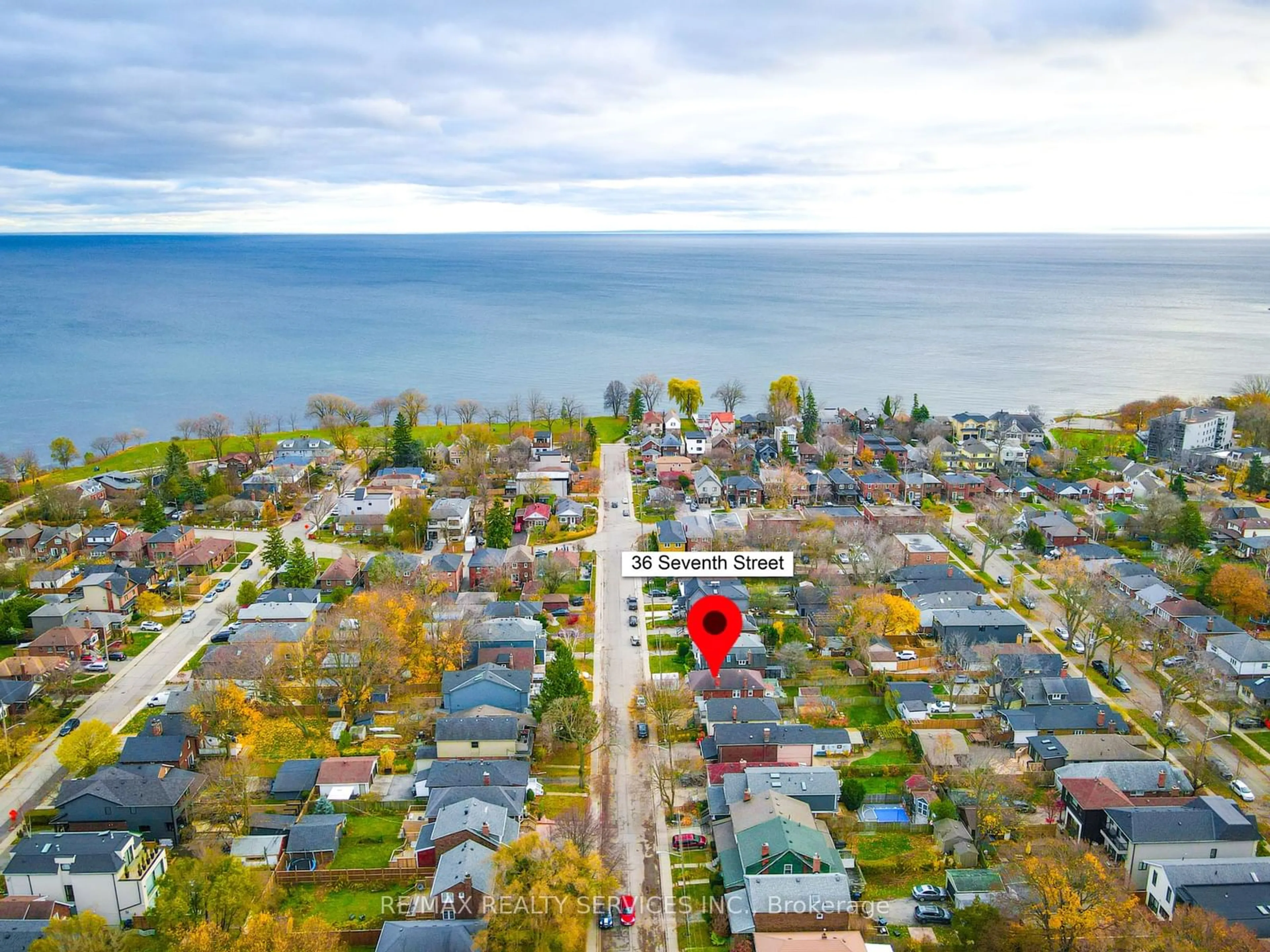 A pic from outside/outdoor area/front of a property/back of a property/a pic from drone, water/lake/river/ocean view for 36 Seventh St, Toronto Ontario M8V 3B2