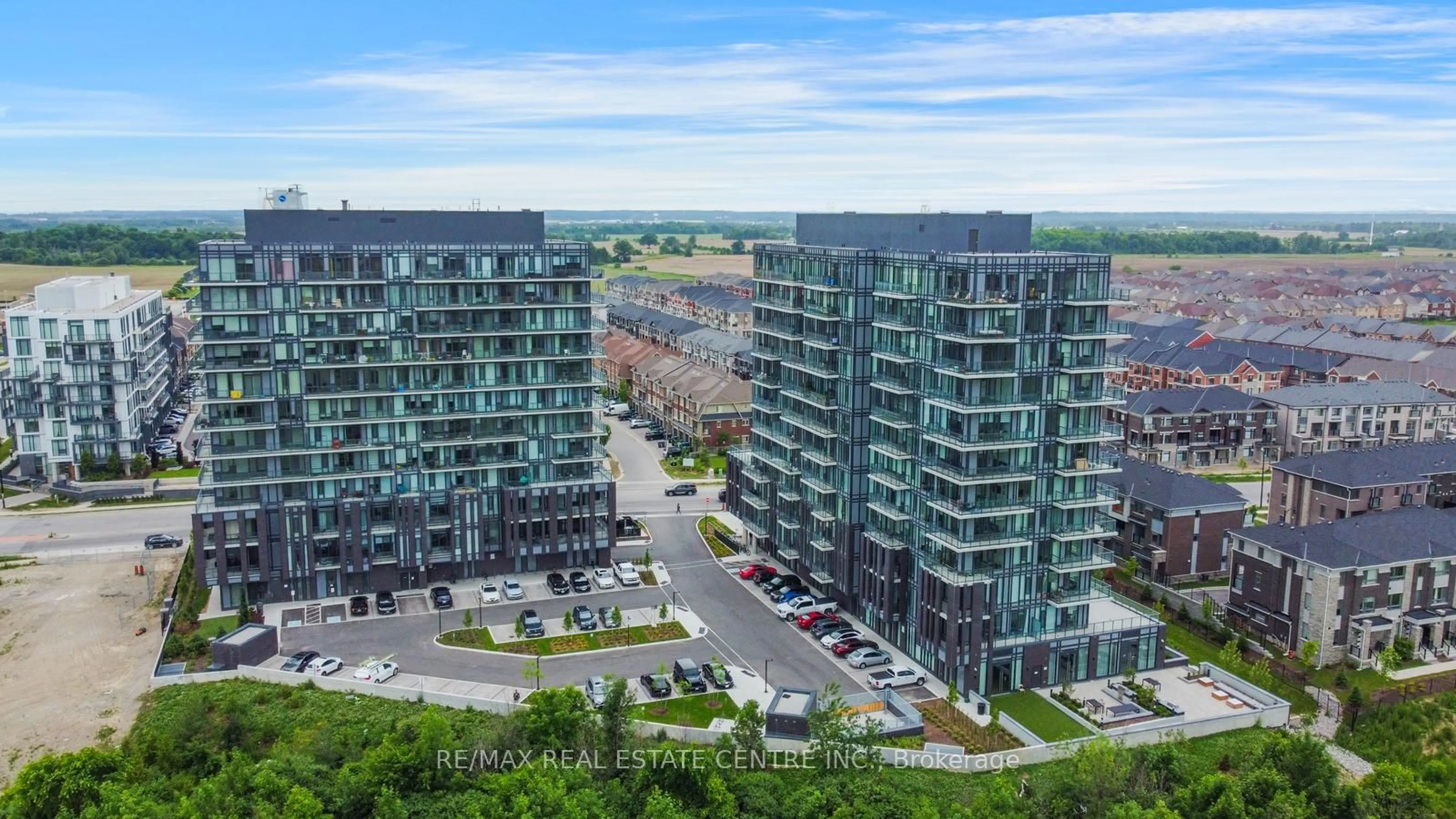 A pic from outside/outdoor area/front of a property/back of a property/a pic from drone, city buildings view from balcony for 215 Veterans Dr #202, Brampton Ontario L7A 4S6