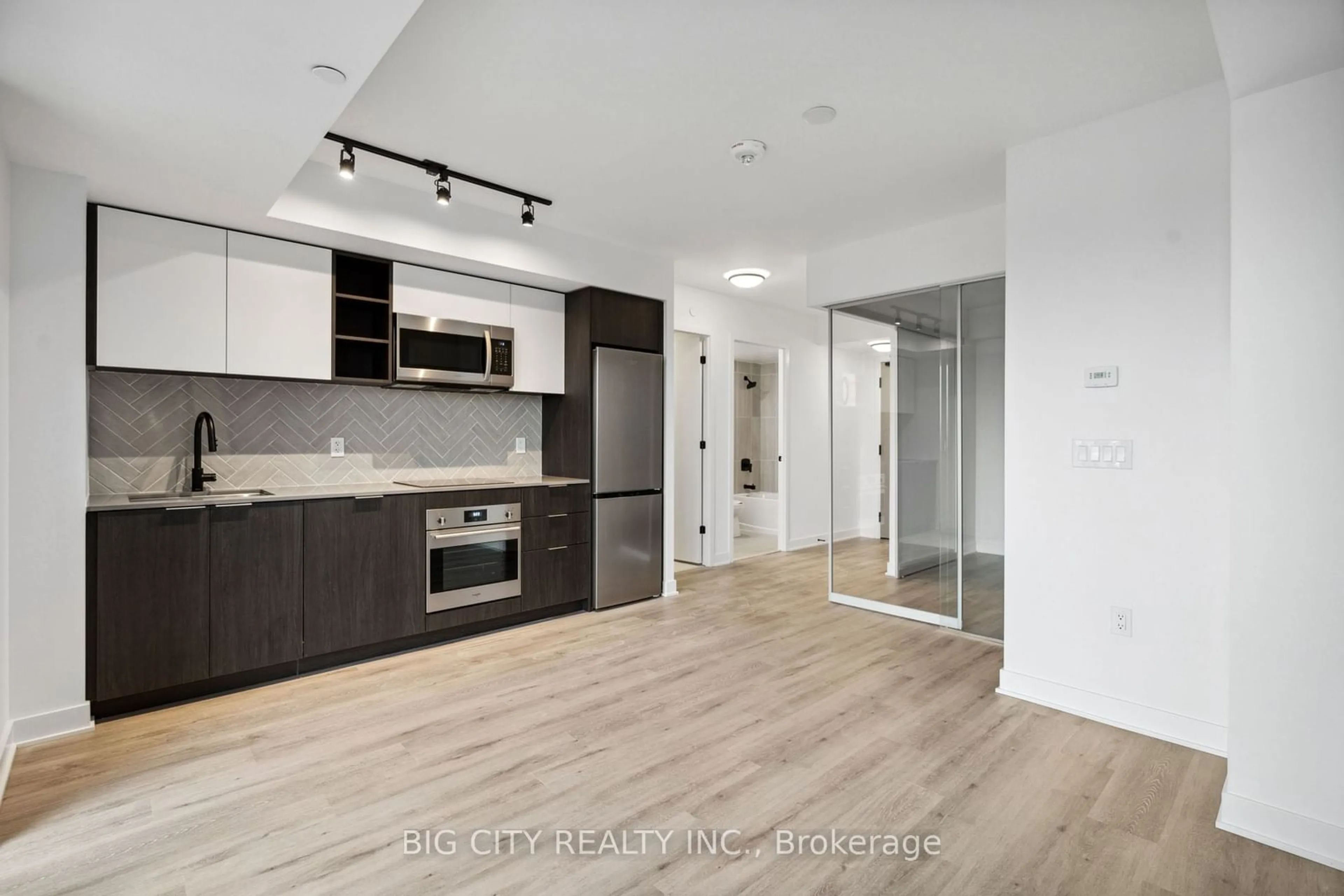 Open concept kitchen, unknown for 36 Zorra St #407, Toronto Ontario M8Z 0G5