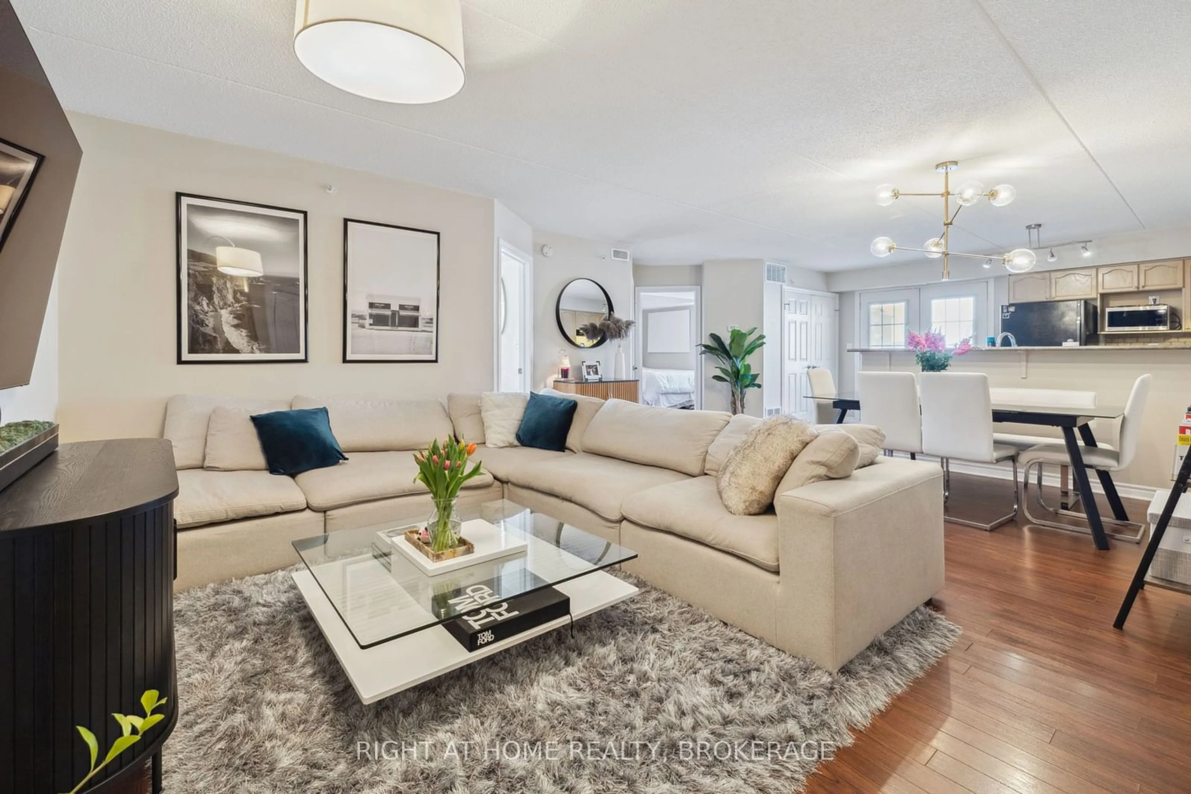 Living room with furniture, unknown for 1460 Bishops Gate #202, Oakville Ontario L6M 4N5