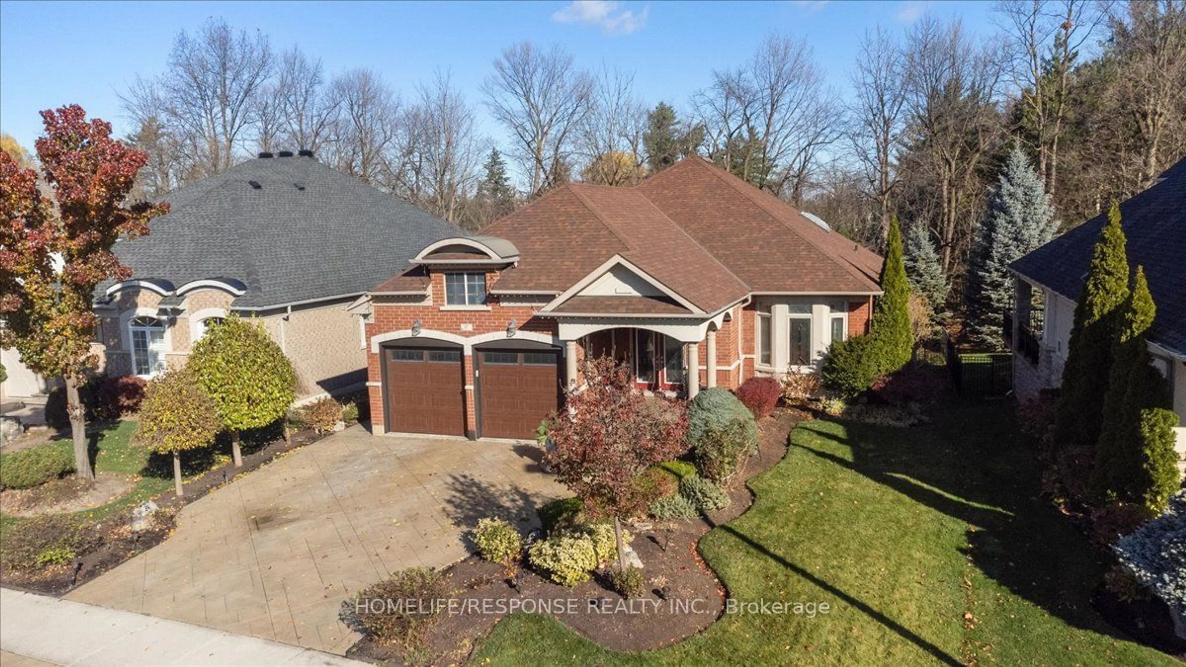 Home with brick exterior material, street for 17 McNutt St, Brampton Ontario L6Y 5L3