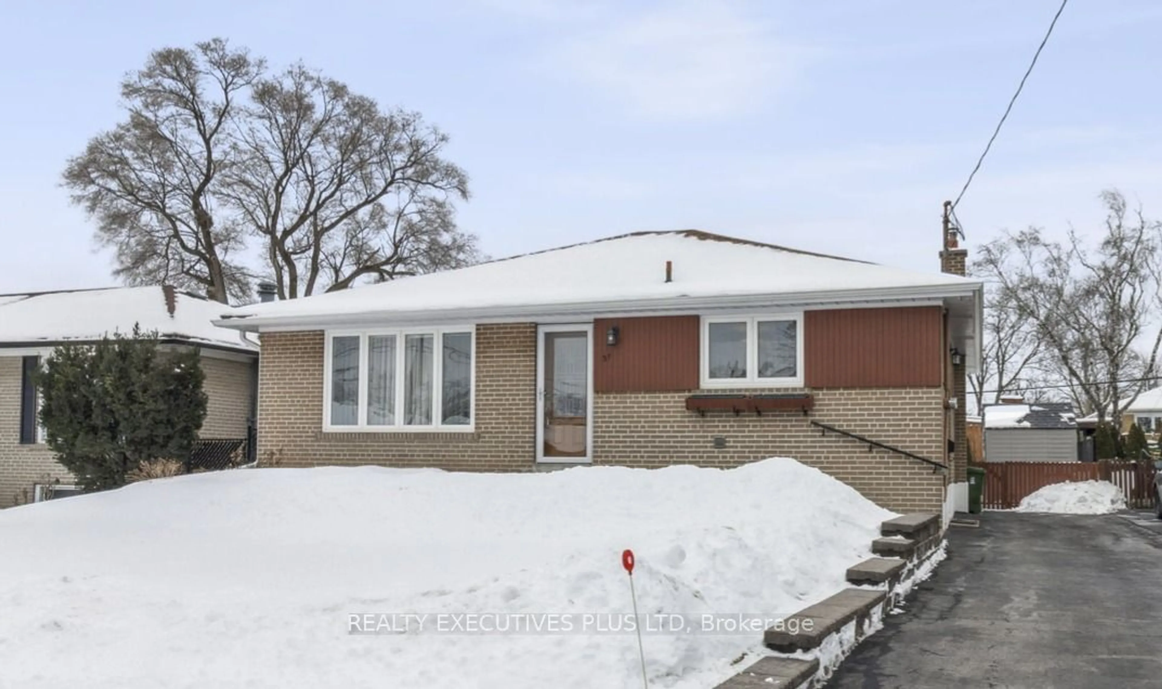 Home with brick exterior material, street for 31 Guiness Ave, Toronto Ontario M9W 3L1