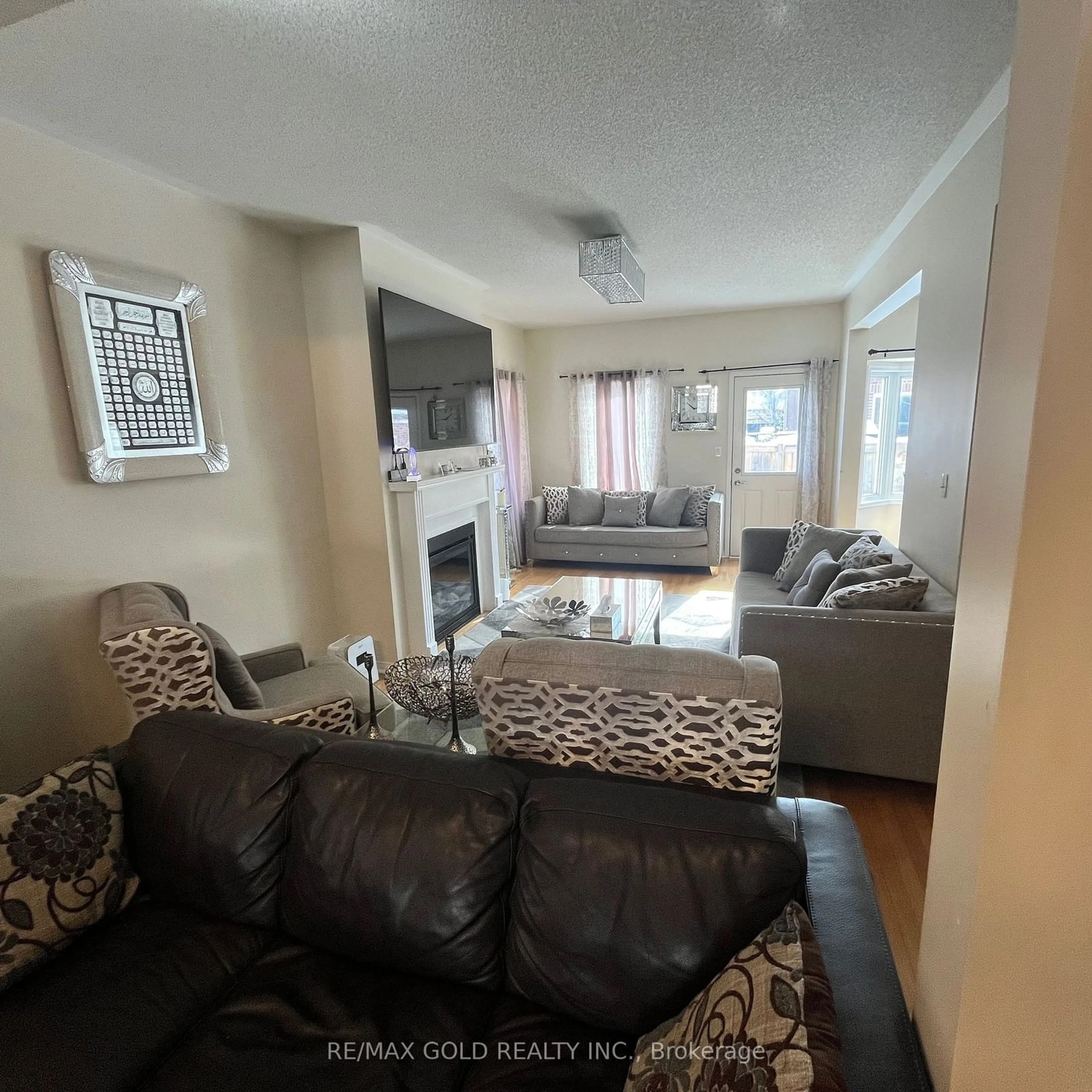 Living room with furniture, unknown for 221 Valleyway Dr, Brampton Ontario L6X 0N9