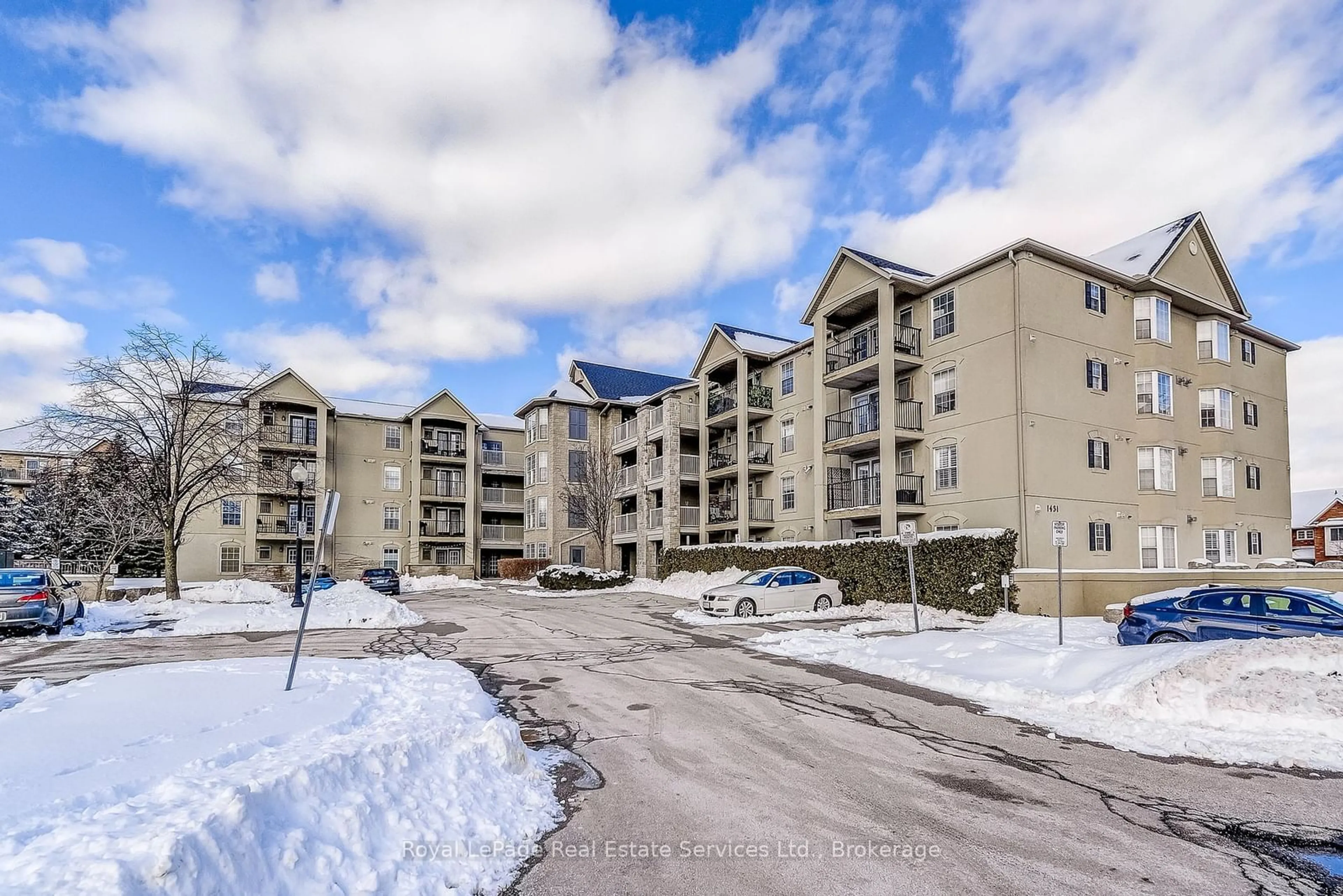 A pic from outside/outdoor area/front of a property/back of a property/a pic from drone, unknown for 1431 Walkers Line #411, Burlington Ontario L7M 4P3