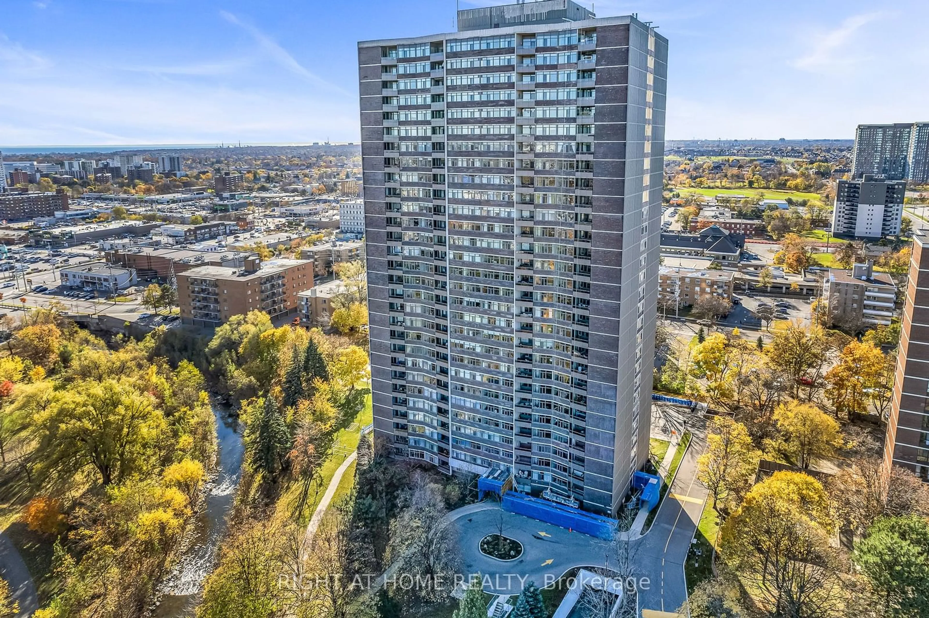 A pic from outside/outdoor area/front of a property/back of a property/a pic from drone, city buildings view from balcony for 3100 Kirwin Ave #308, Mississauga Ontario L5A 3S6