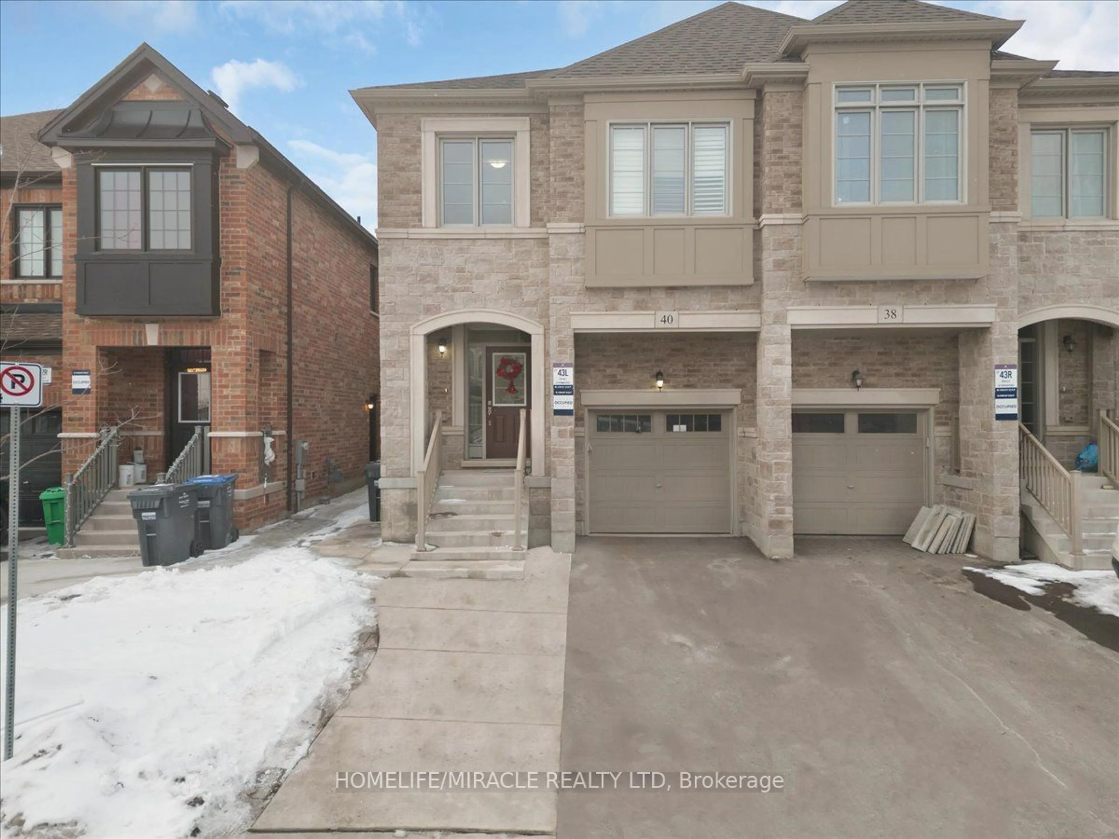 Home with brick exterior material, street for 40 Fordham Rd, Brampton Ontario L6Y 6K2