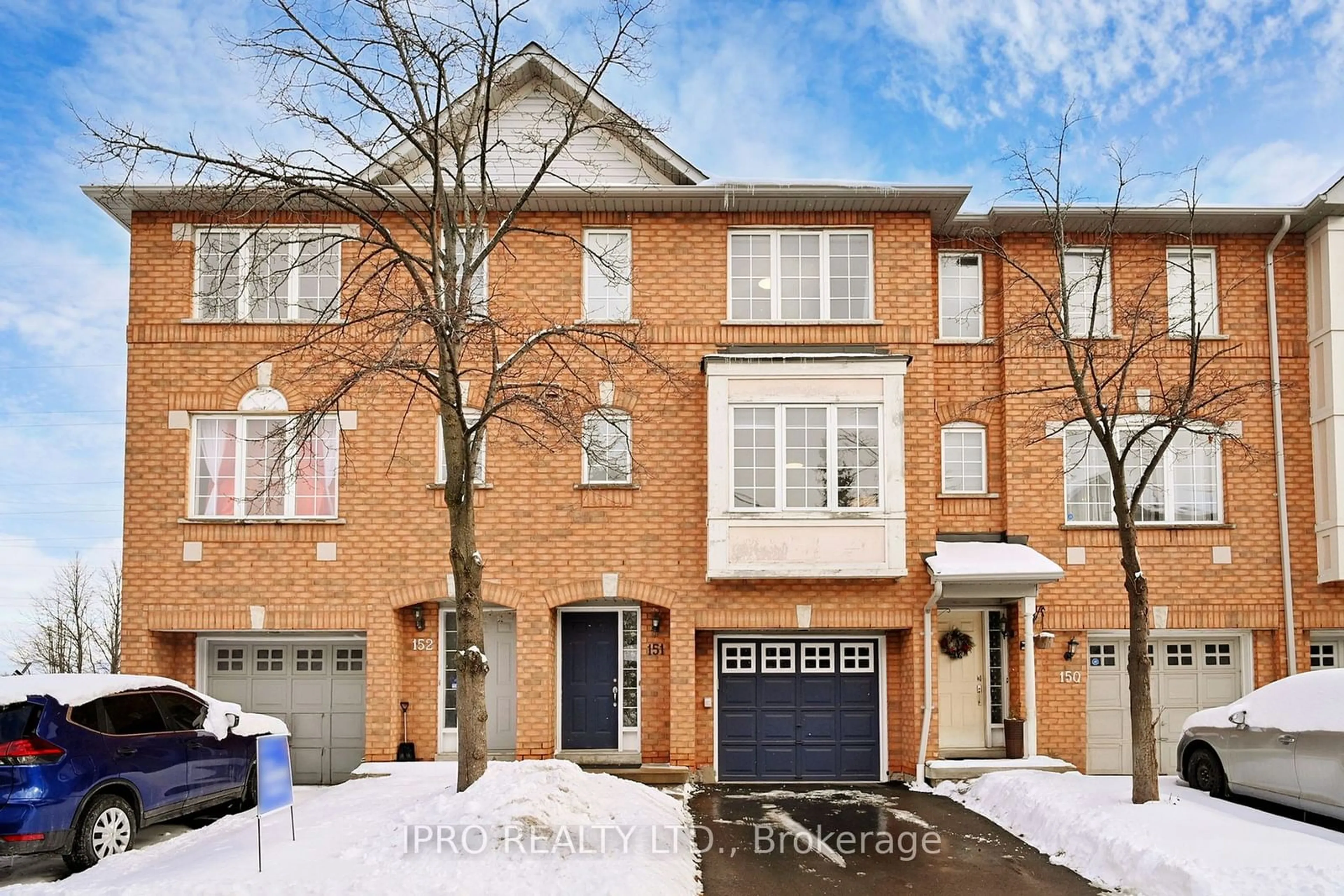 Home with brick exterior material, street for 80 Acorn Pl #151, Mississauga Ontario L4Z 4C7