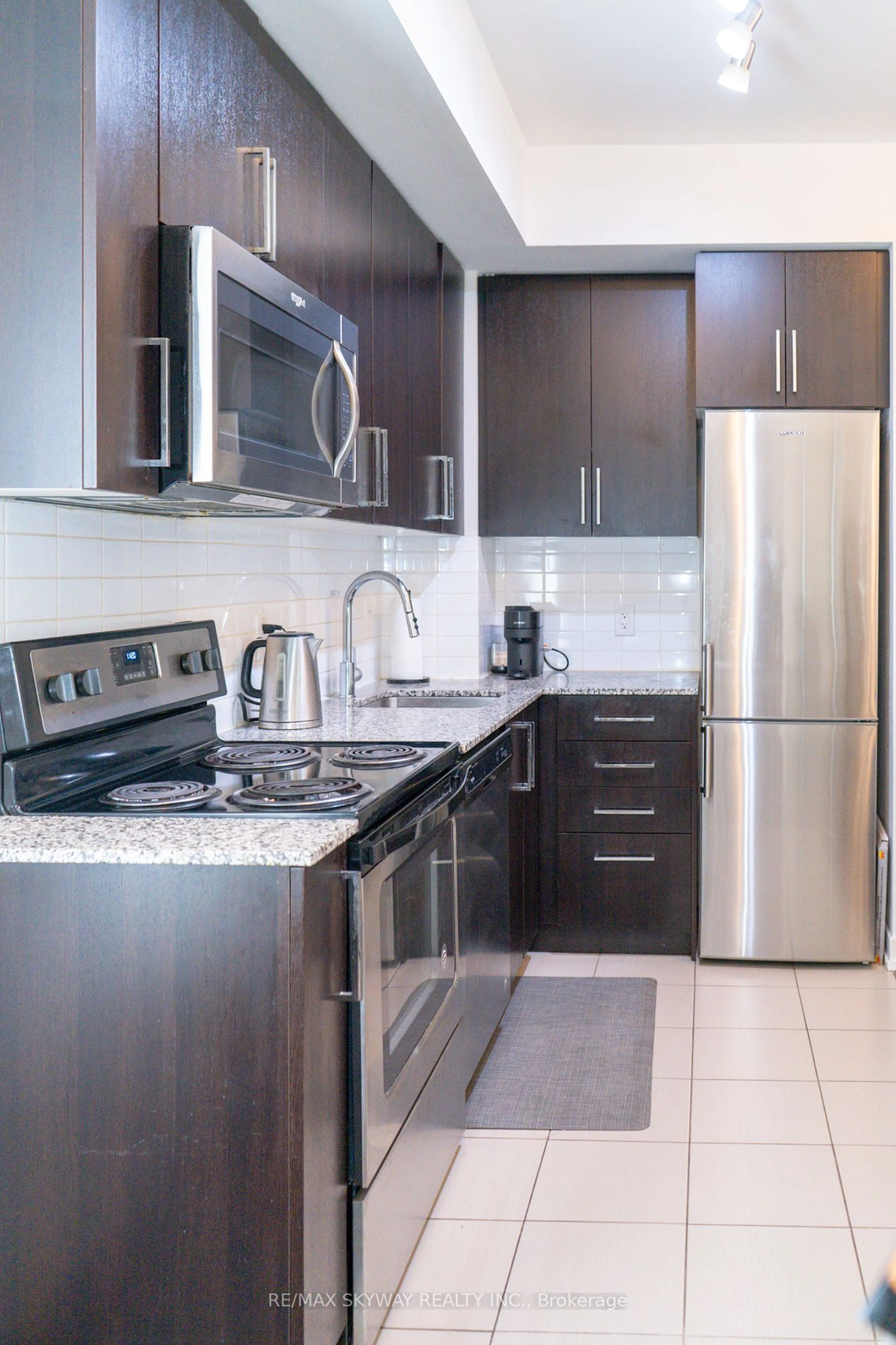 Standard kitchen, ceramic/tile floor for 840 Queens Plate Dr #912, Toronto Ontario M9W 7J9