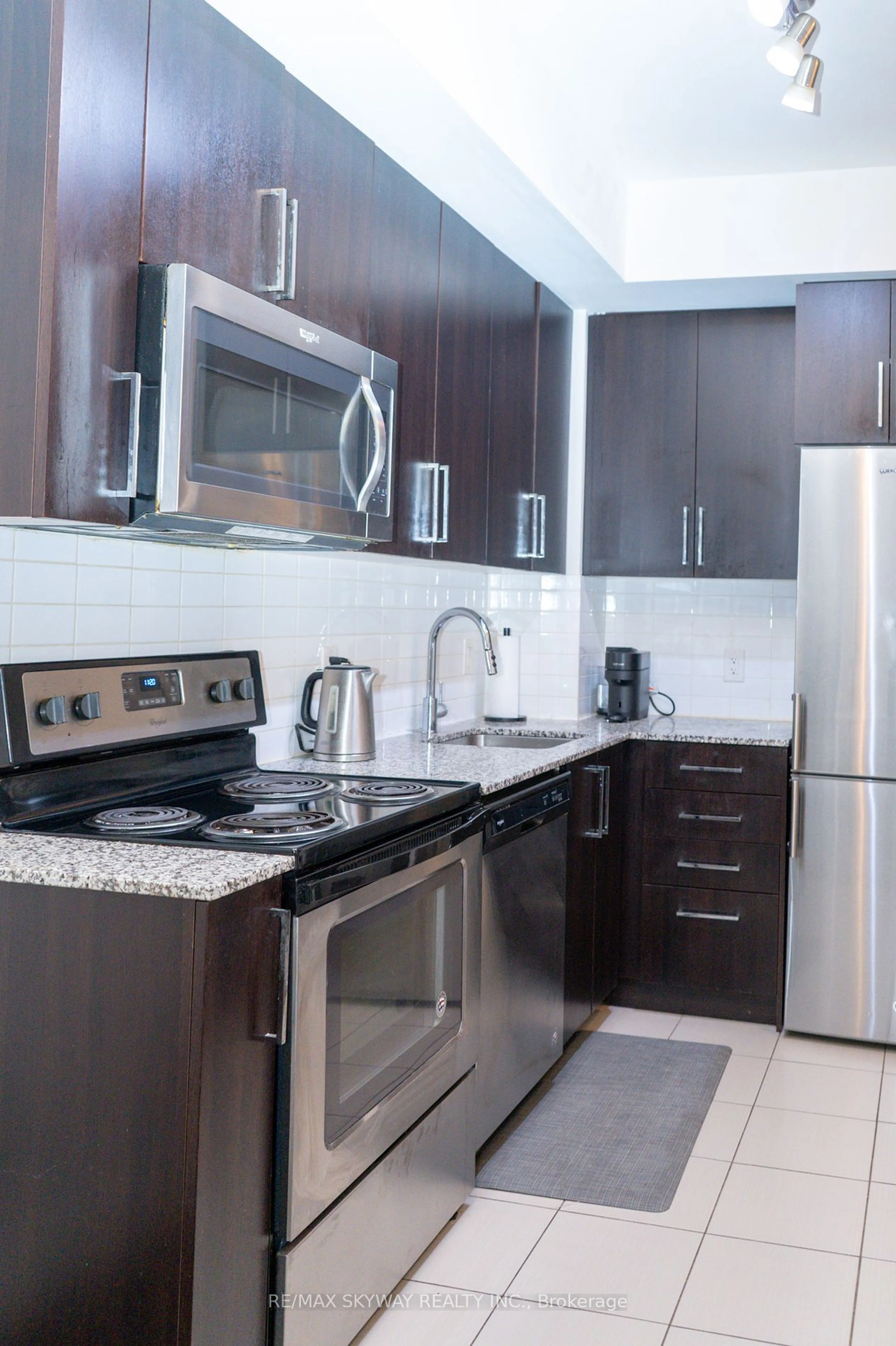 Standard kitchen, ceramic/tile floor for 840 Queens Plate Dr #912, Toronto Ontario M9W 7J9