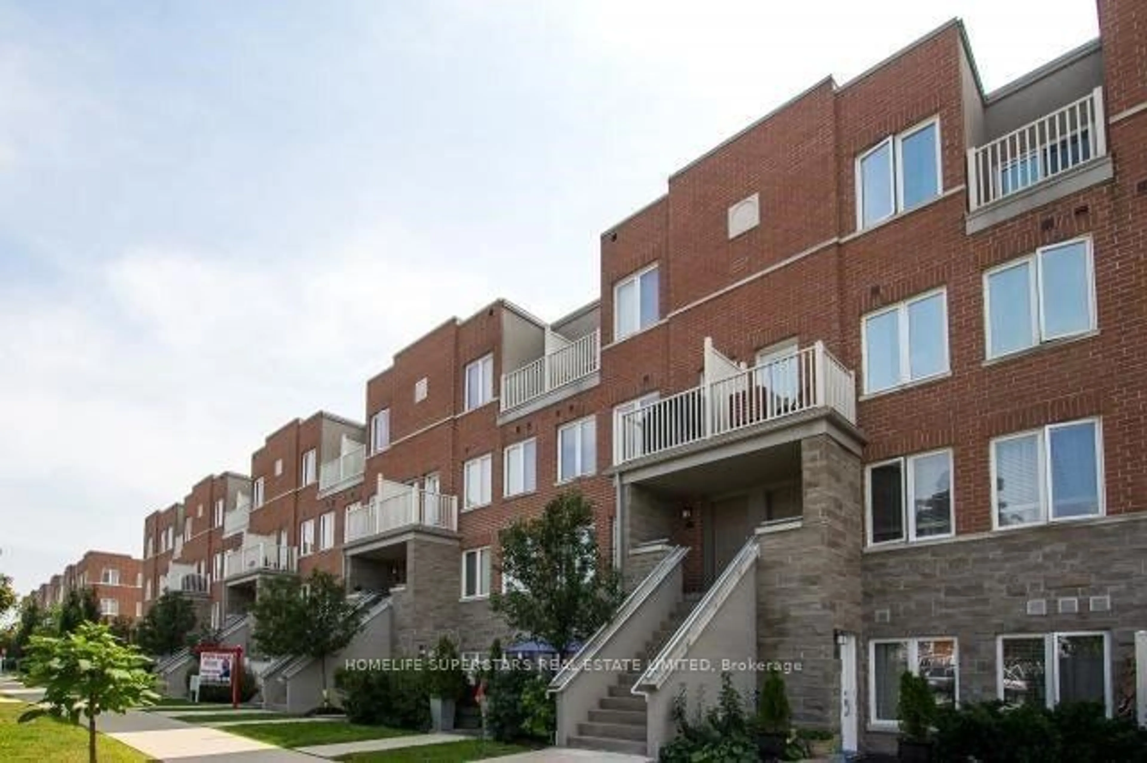 Home with brick exterior material, street for 25 Richgrove Dr #102, Toronto Ontario M9R 0A3