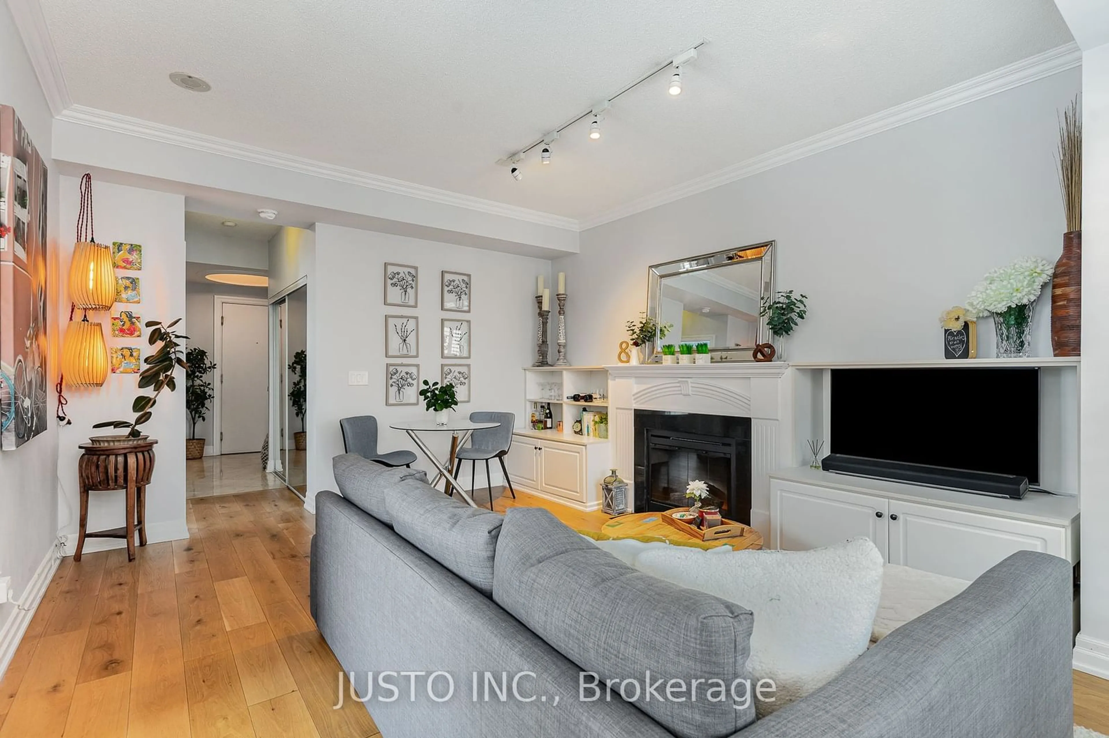 Living room with furniture, wood/laminate floor for 2083 Lake Shore Blvd #1614, Toronto Ontario M8V 4G2