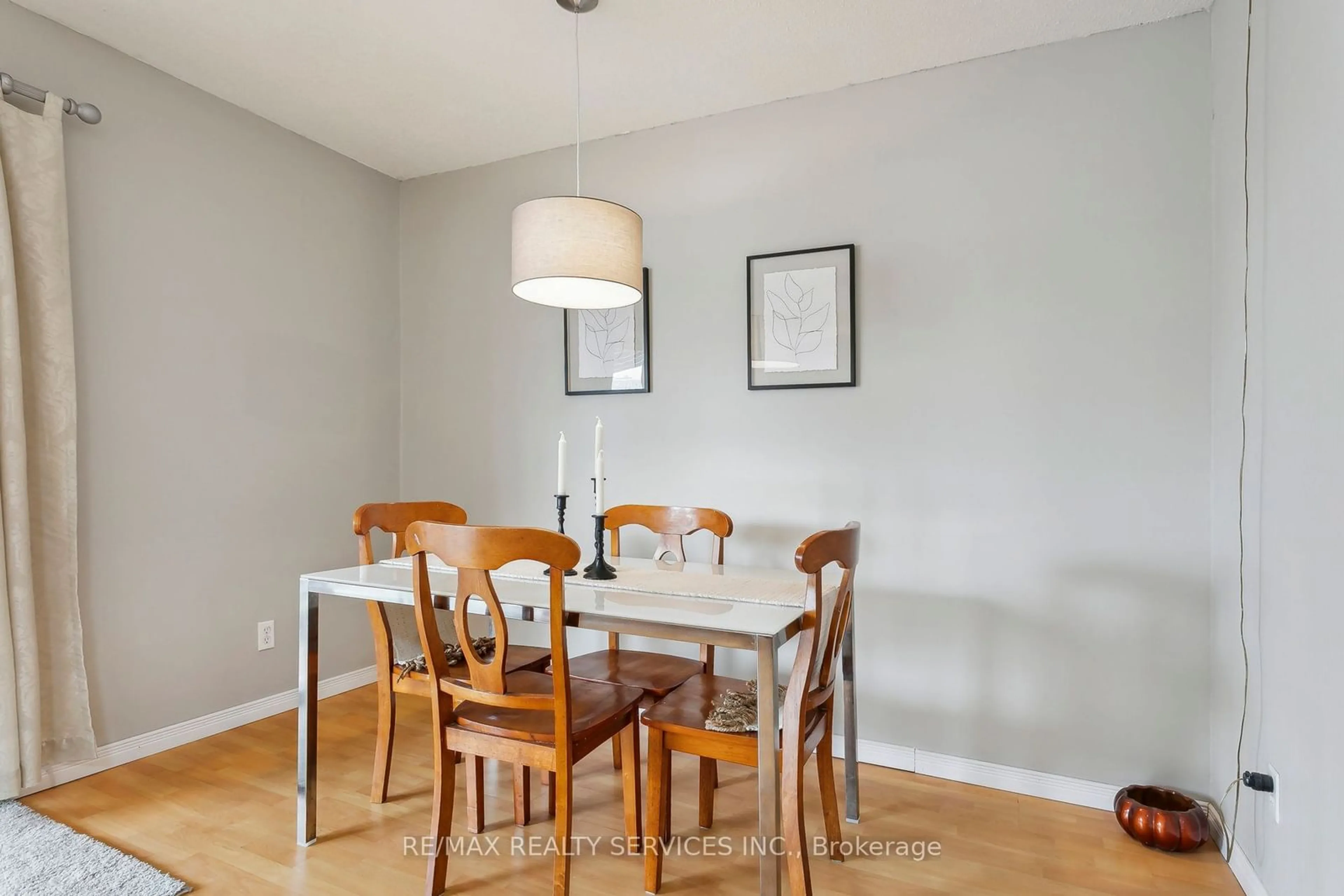 Dining room, wood/laminate floor for 101 Greene Dr, Brampton Ontario L6V 2P2