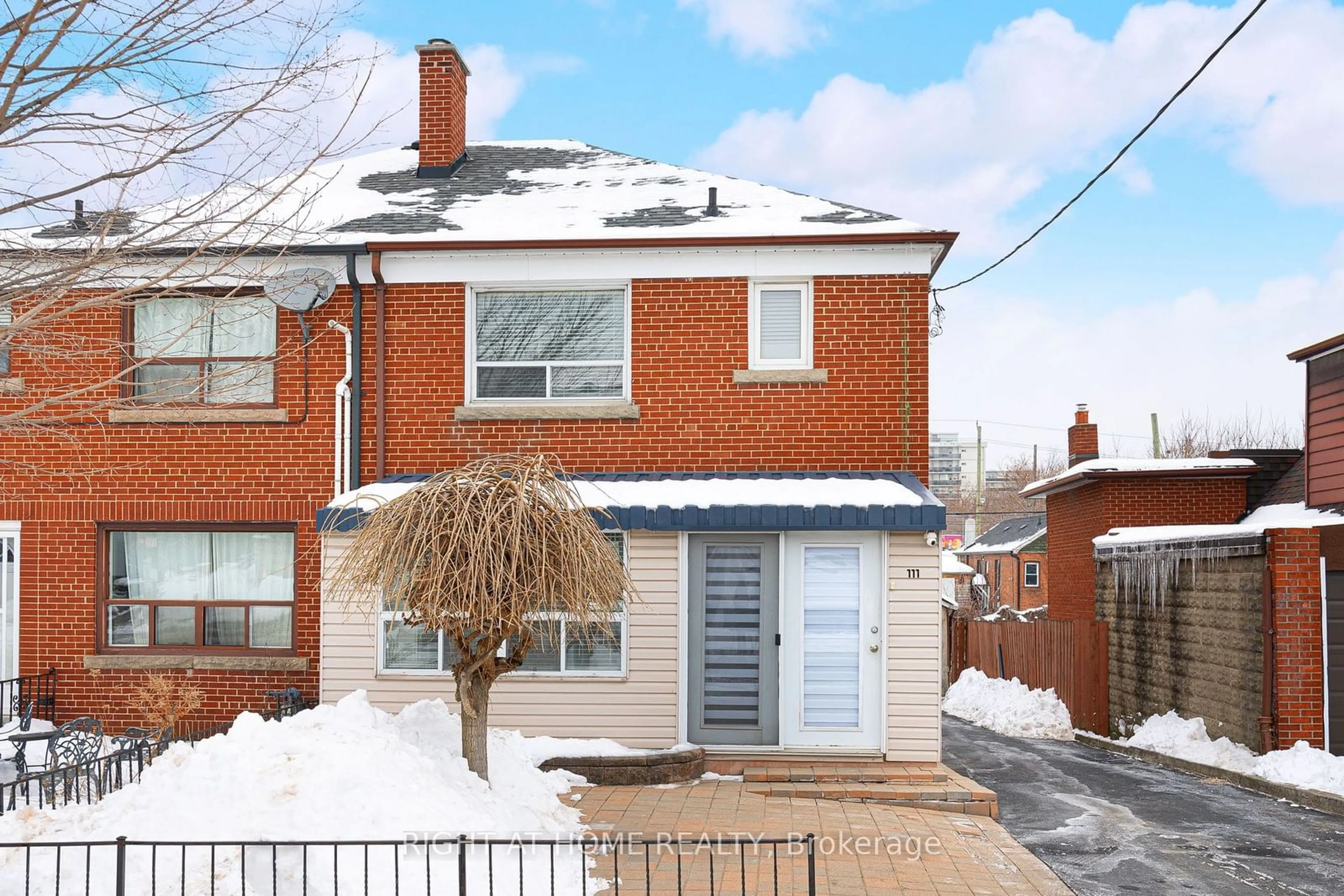 Home with brick exterior material, street for 111 Dynevor Rd, Toronto Ontario M6E 3X3