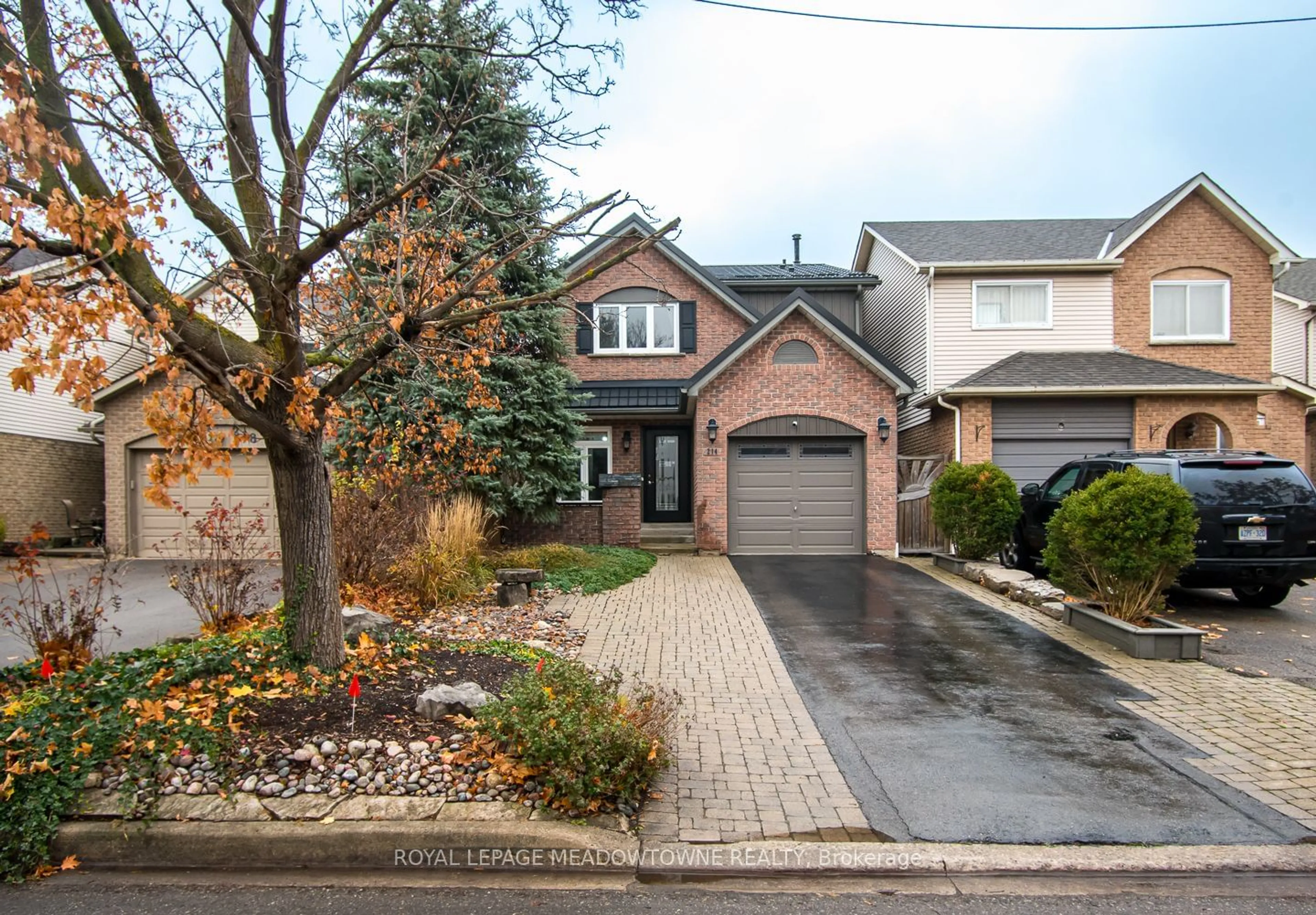 Home with brick exterior material, street for 214 Harvest Dr, Milton Ontario L9T 4T3