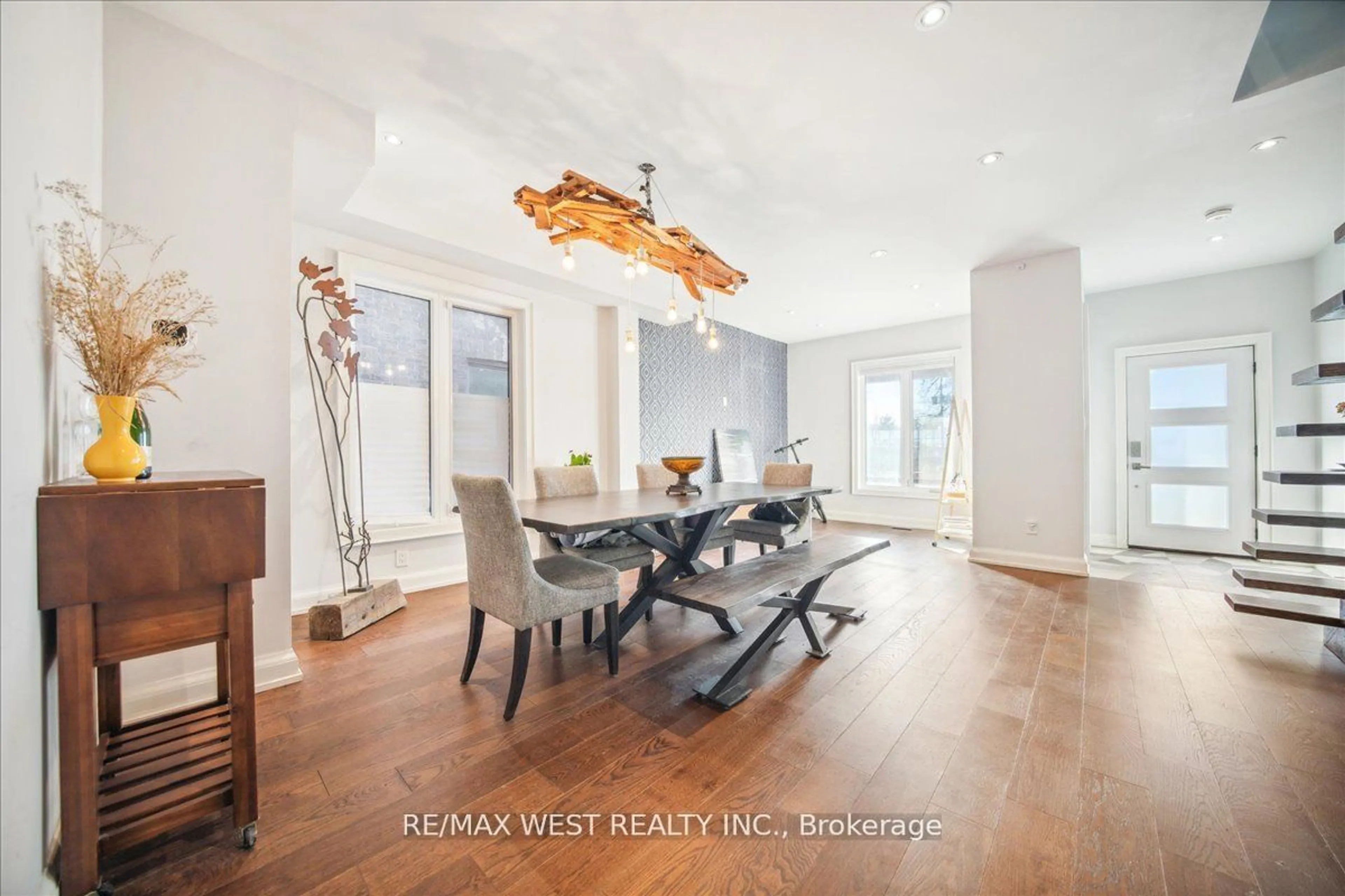 Dining room, wood/laminate floor for 33 Edwin Ave, Toronto Ontario M6P 3Z5