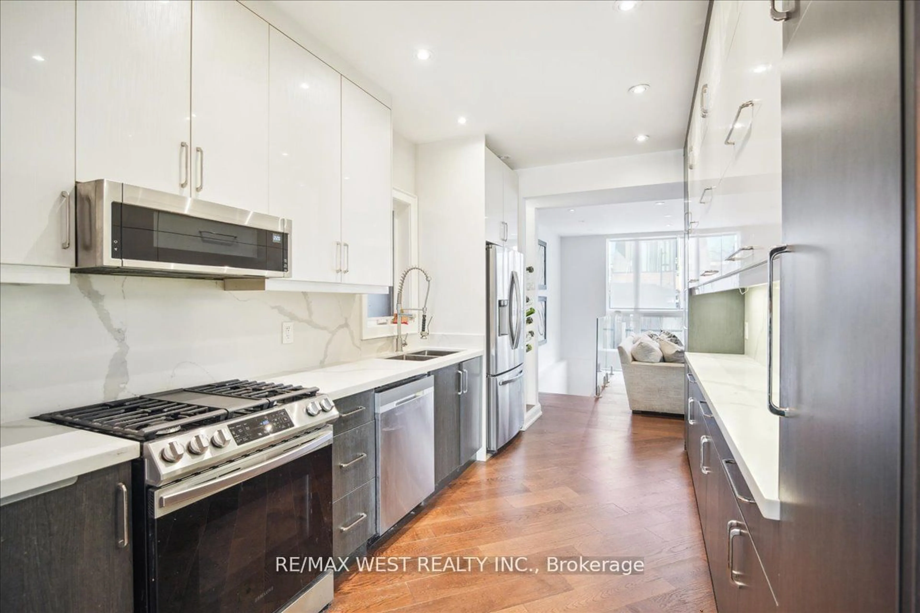 Open concept kitchen, ceramic/tile floor for 33 Edwin Ave, Toronto Ontario M6P 3Z5