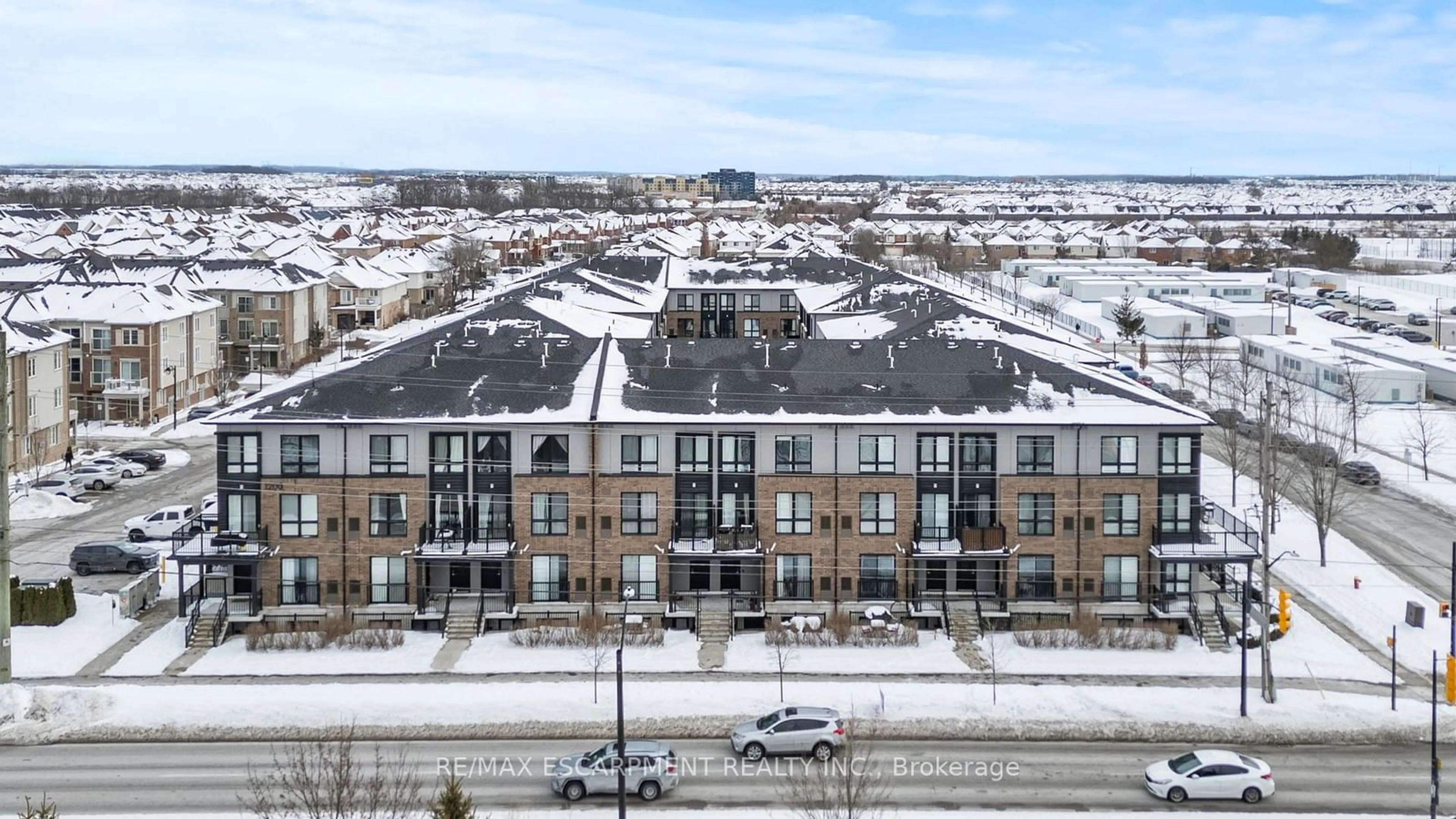 A pic from outside/outdoor area/front of a property/back of a property/a pic from drone, unknown for 1200 Main St #102, Milton Ontario L9T 8M7