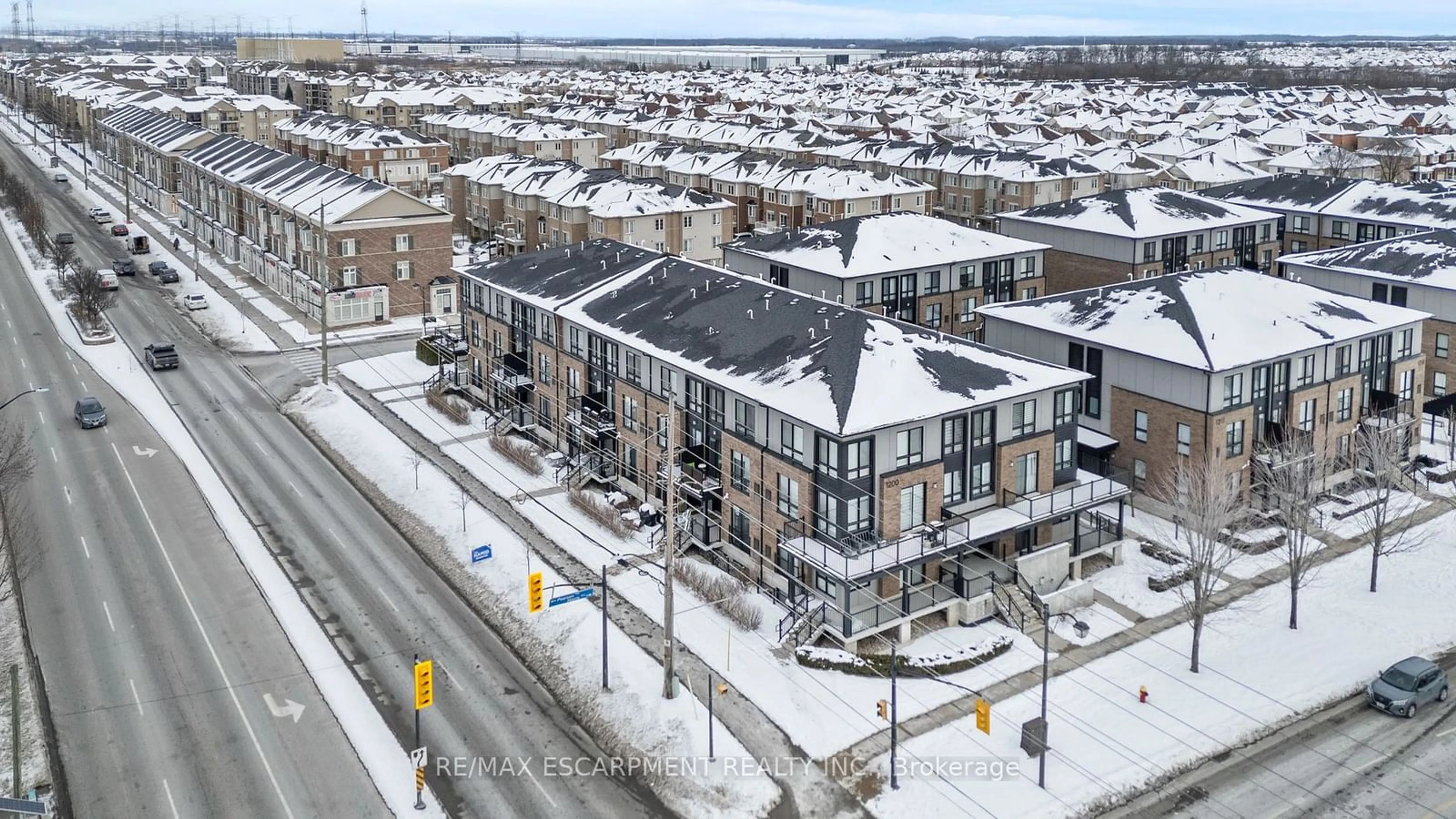 A pic from outside/outdoor area/front of a property/back of a property/a pic from drone, city buildings view from balcony for 1200 Main St #102, Milton Ontario L9T 8M7