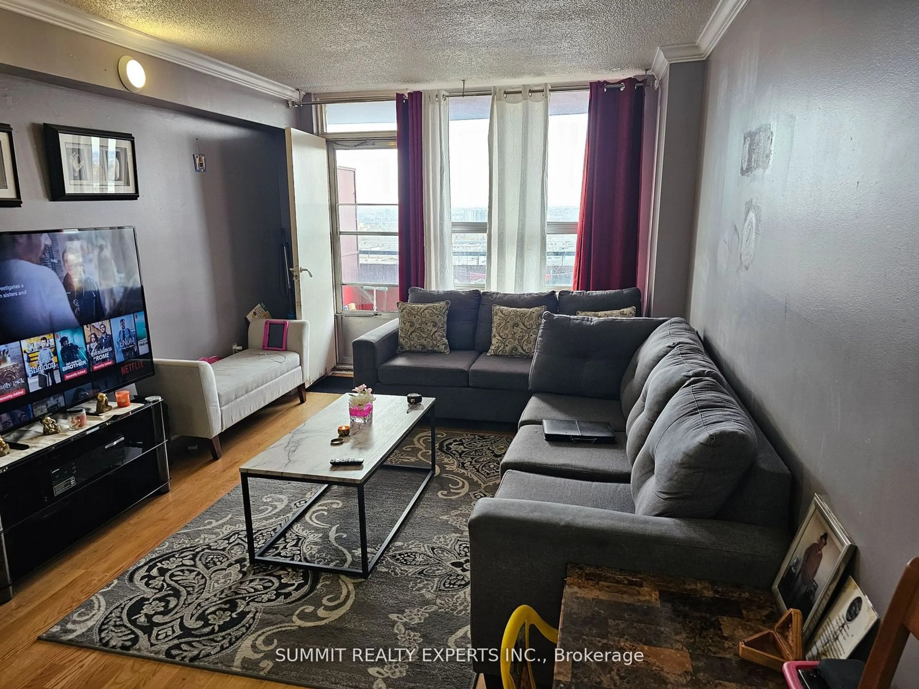 Living room with furniture, unknown for 100 Lotherton Pkwy #1107, Toronto Ontario M6B 2G8